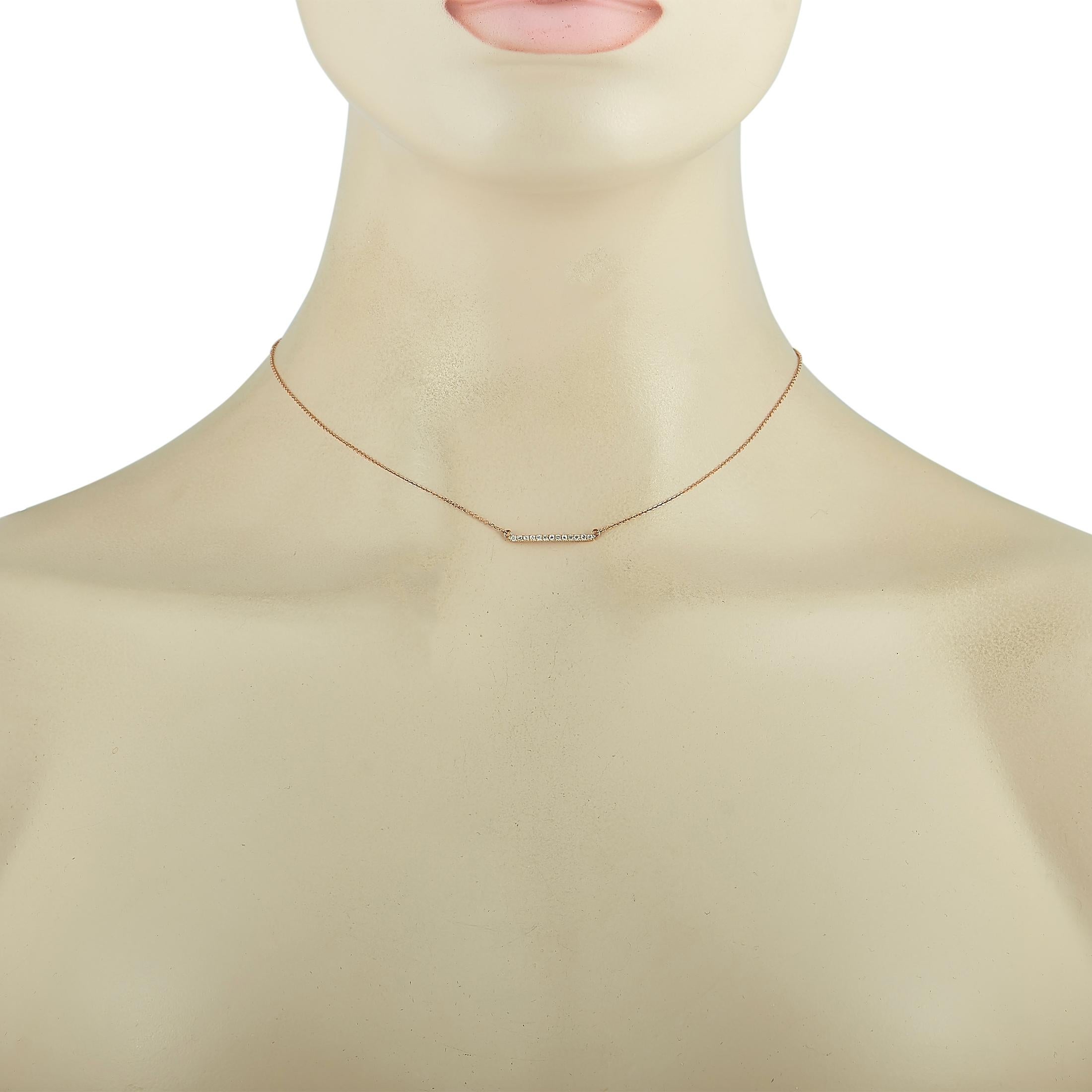 This LB Exclusive necklace is made of 18K rose gold and embellished with diamonds that amount to 0.13 carats. The necklace weighs 1.6 grams and boasts a 15” chain and a pendant that measures 0.06” in length and 0.80” in width.
 
 Offered in brand