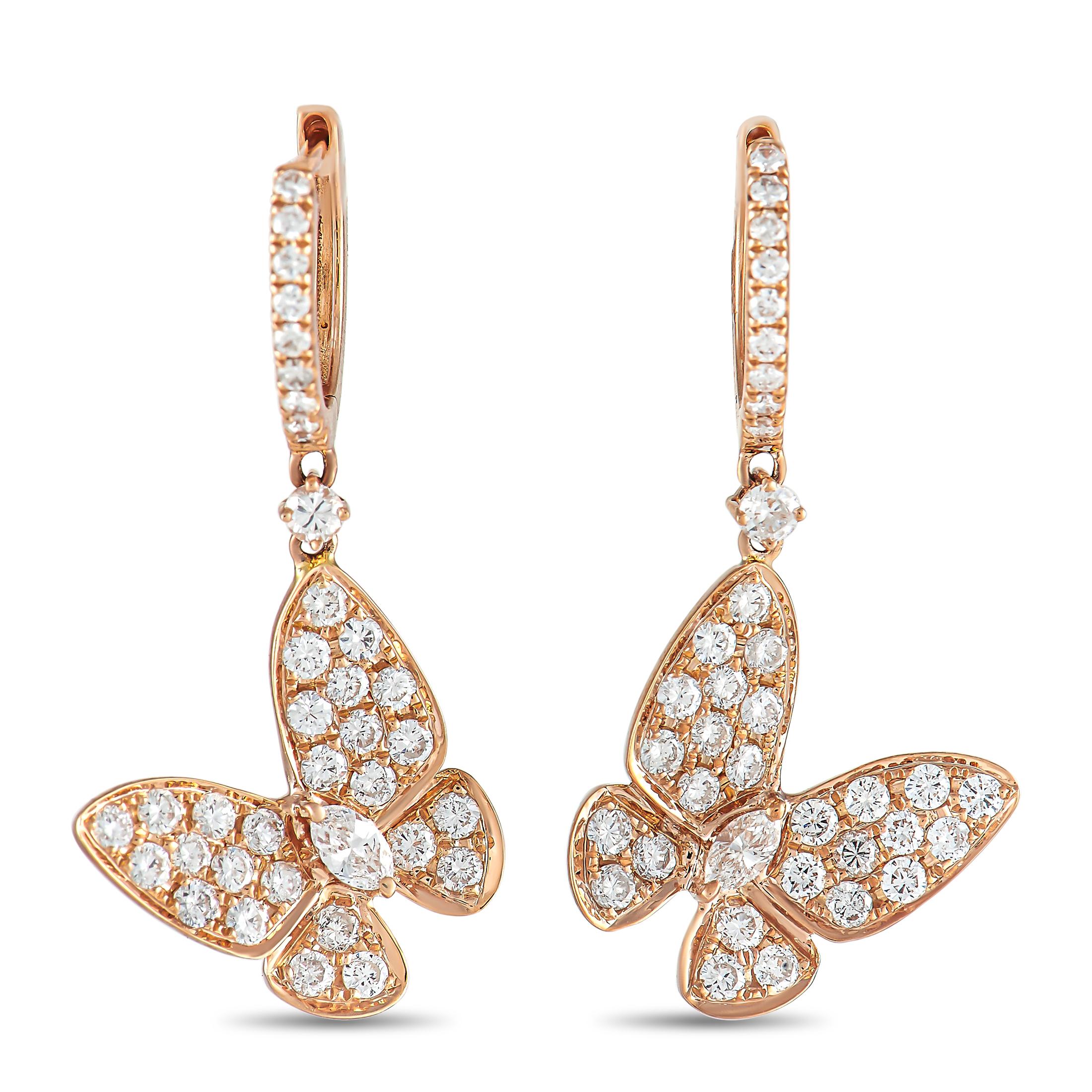These charming earrings possess a delightful sense of movement. Crafted from 18K Rose Gold, each small hoop features a dangling butterfly motif that will gracefully accompany your every movement. Each earring measures 1.25” long and 0.65” wide -