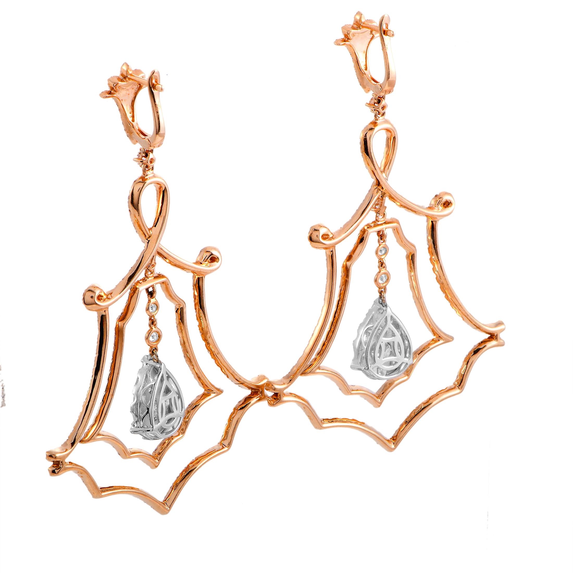 These LB Exclusive earrings are crafted from 18K rose gold and each of the two weighs 11.1 grams, measuring 3” in length and 2” in width. The earrings are embellished with a total of 5.25 carats of diamonds.

This pair of earrings is offered in