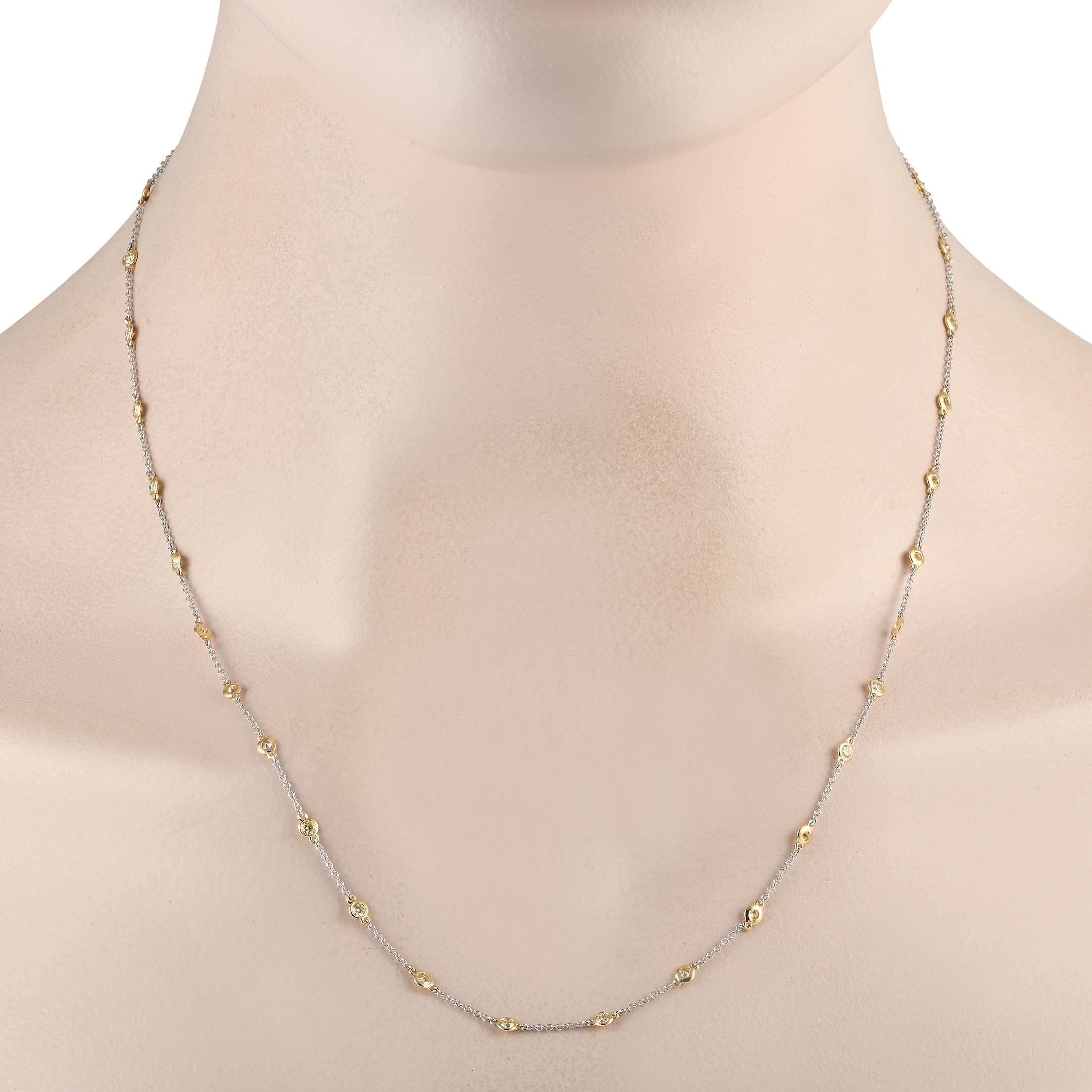 An elegant addition to any outfit. This 20-inch-long necklace is so easy to pair with anything and everything. Shimmering diamonds on evenly-spaced yellow gold bezels run along its white gold chain. It's the perfect accessory to amp the style of a