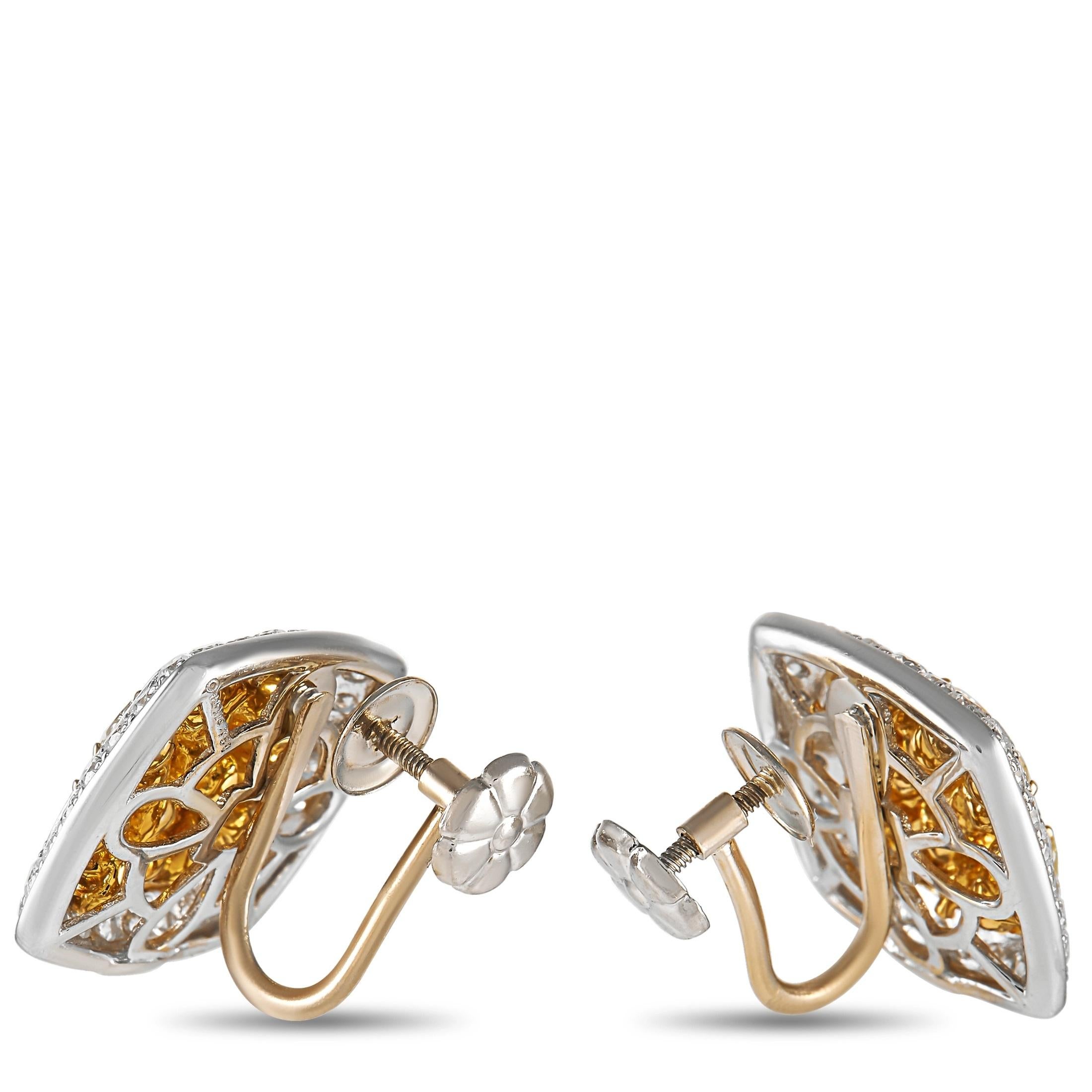 Fancy yellow diamonds with a total weight of 2.60 carats set within 18K Yellow Gold make a statement at the center of these opulent earrings. Around the perimeter, you’ll also find an 18K White Gold setting adorned with 1.07 carats of sparkling