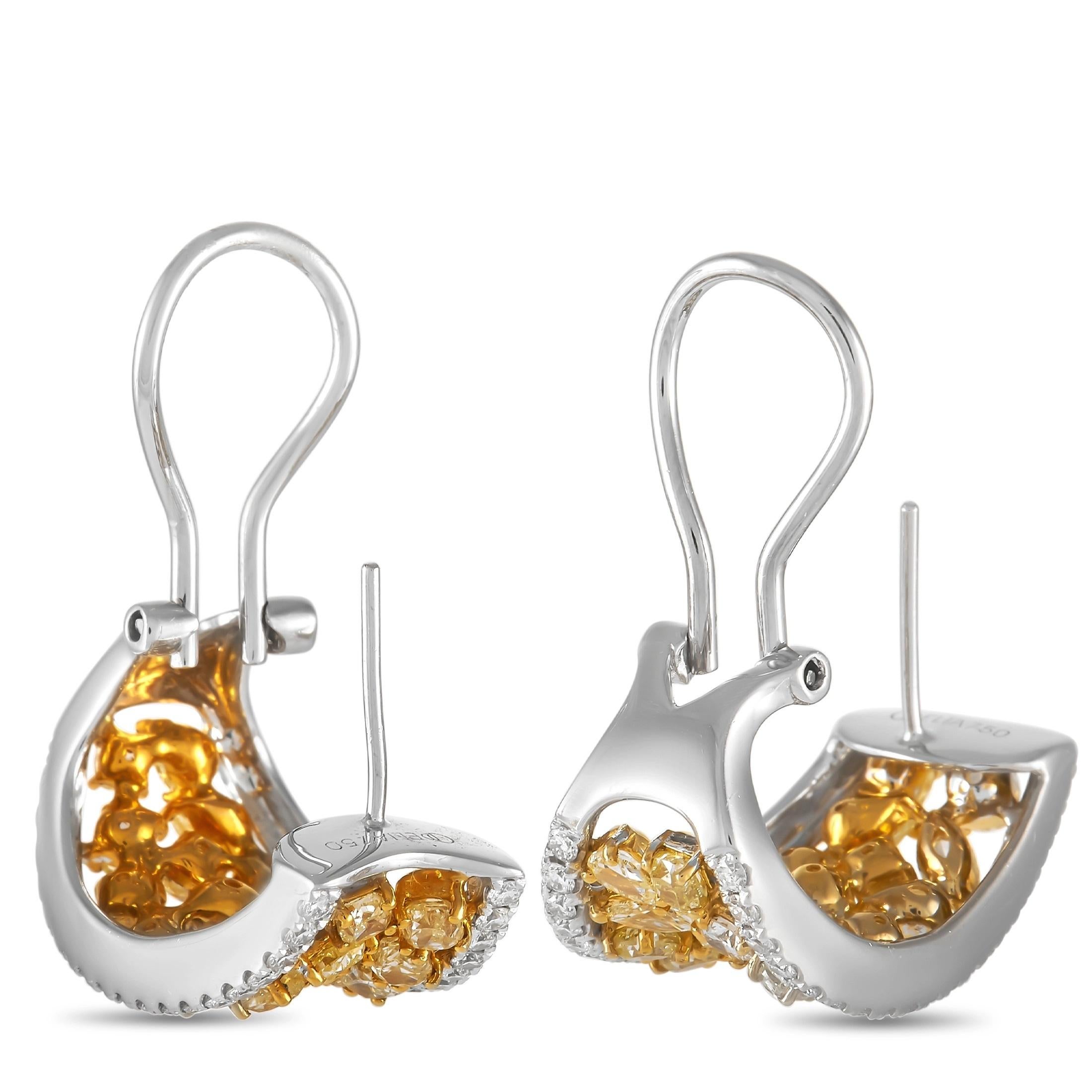 Luxury takes center stage when it comes to these elegant earrings. A stylish setting featuring 18K White Gold and 18K Yellow Gold provides the perfect foundation for gemstones with contrasting hues. On the edges, you’ll find a series of white