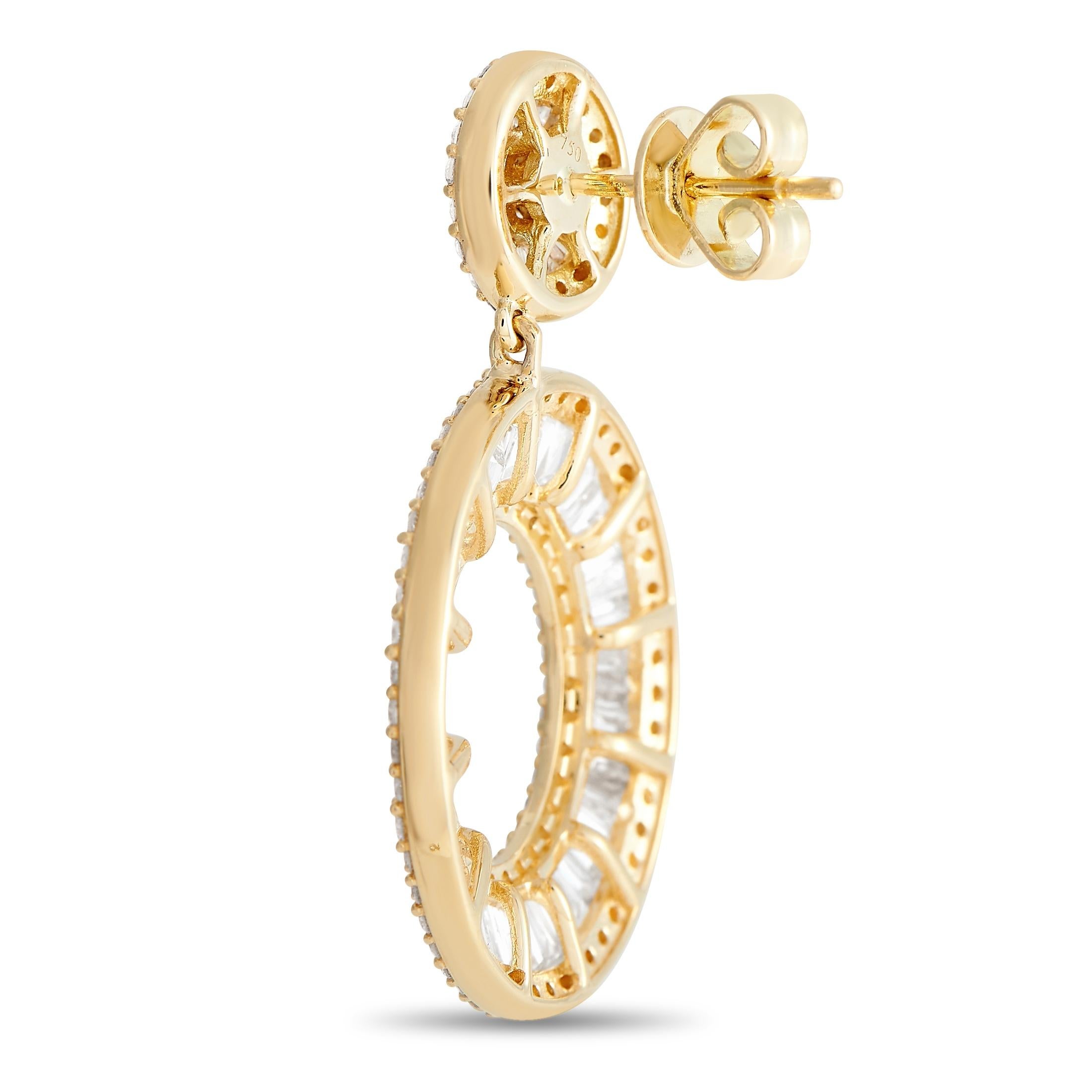 These dynamic earrings will continually make a statement. Each classically elegant setting measures 1.25” long, 0.88” wide, and is crafted from a combination of 18K Yellow Gold and 18K White Gold. Diamond baguettes totaling 3.39 carats and