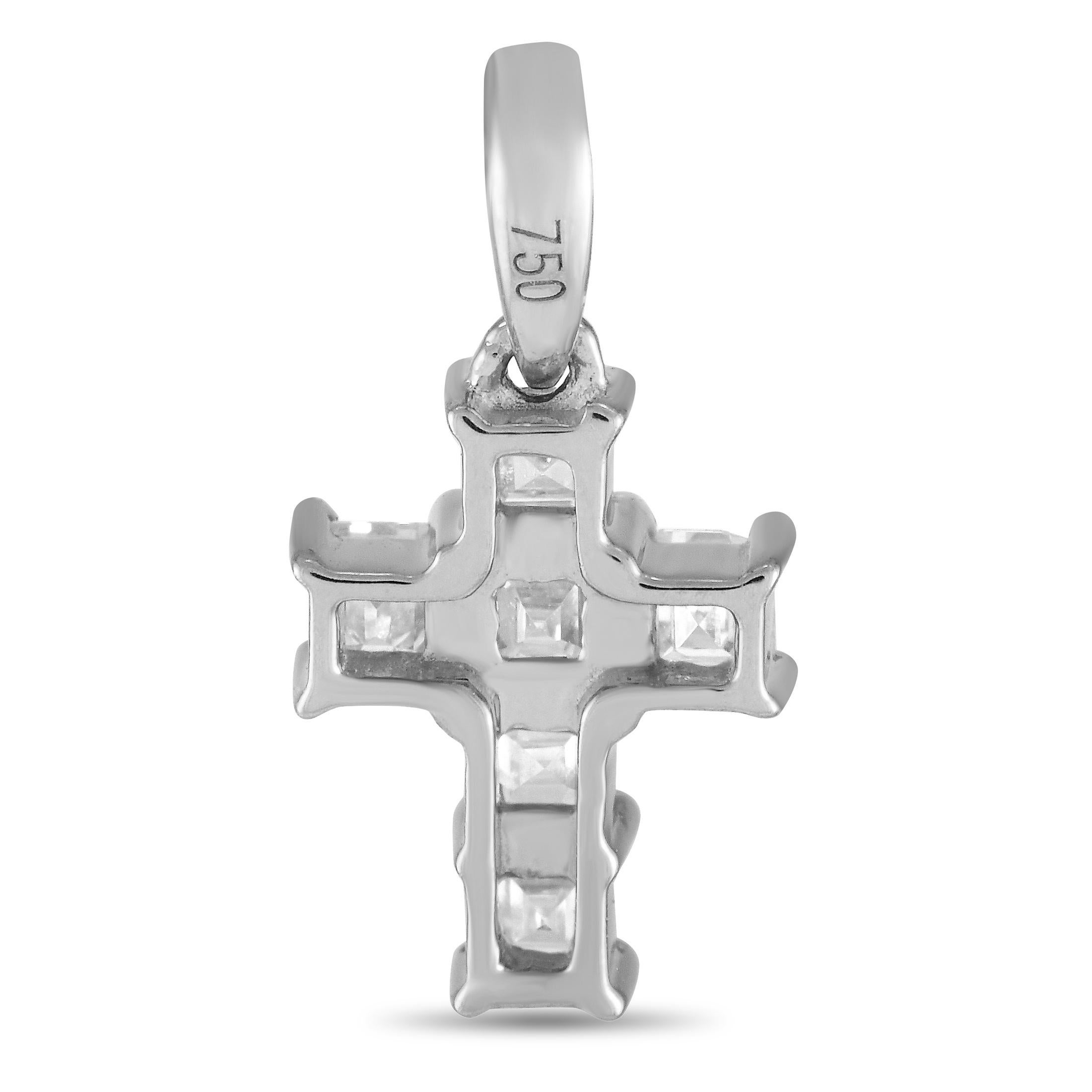 Sparkling square-cut Diamonds totaling 0.28 carats make this cross shaped pendant incredibly captivating. Crafted from 18K White Gold, it measures 0.50 long by 0.25 wide.This jewelry piece is offered in brand new condition and includes a gift box.