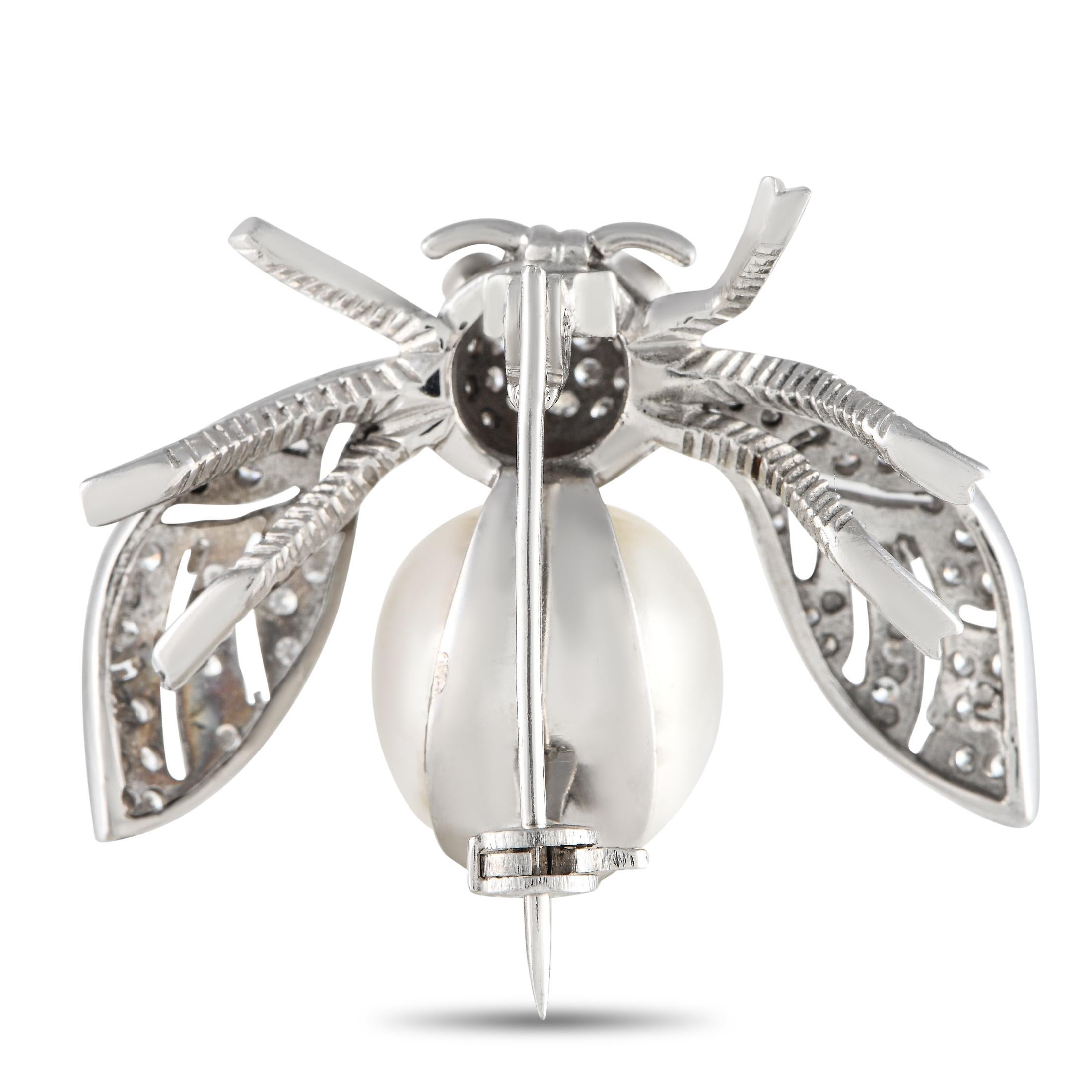Set any ensemble apart by adding this exquisite 18K White Gold brooch. Designed to resemble a dainty bug, this piece comes to life thanks to intricate metalwork on the “wings,” an opulent pearl body, and sparkling inset diamonds totaling 0.60