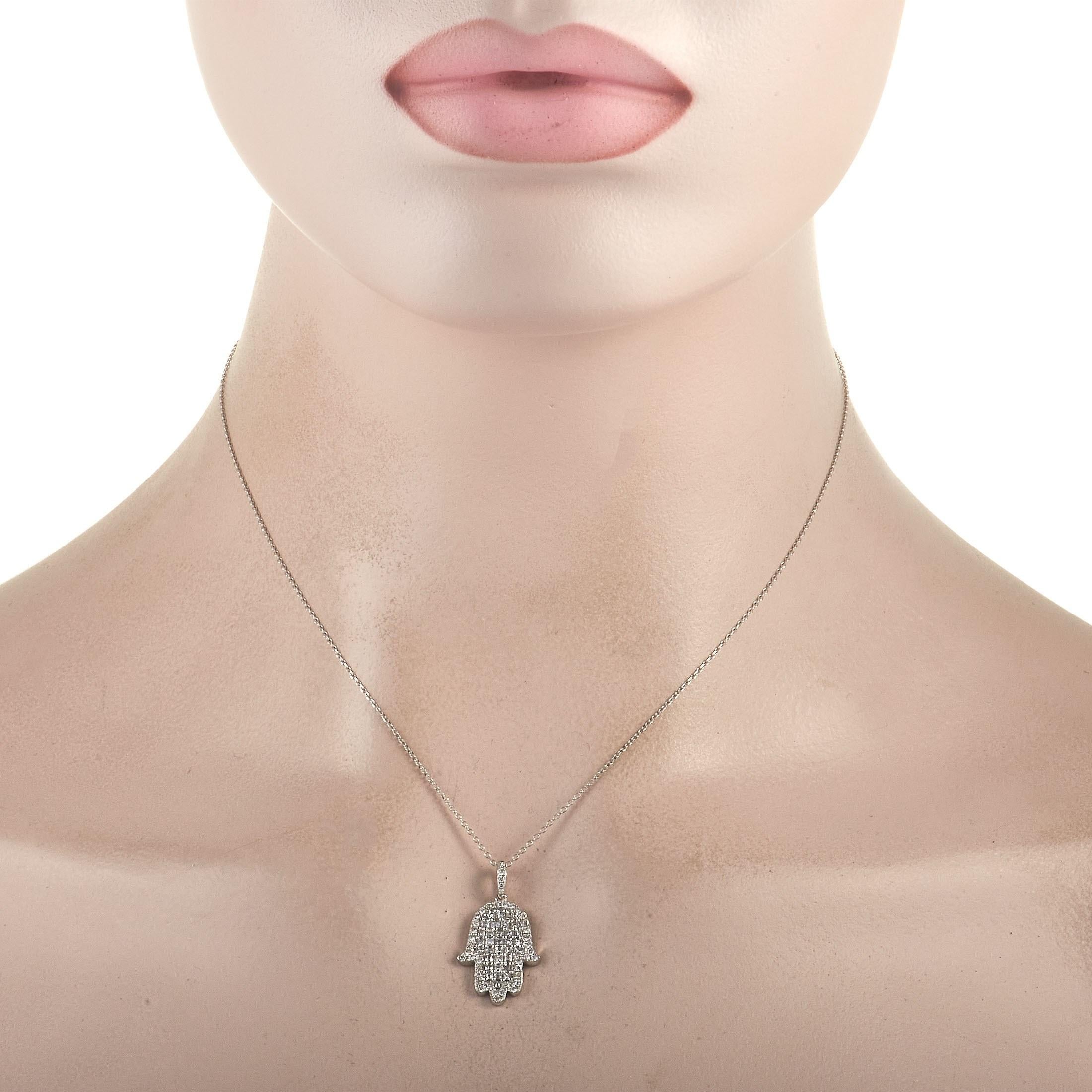 Wear this LB Exclusive 18K White Gold 0.90 ct Diamond Hamsa Necklace and make any outfit sparkle while attracting positive energy and good vibes. On a 16-inch long white gold chain is a sculpted Hamsa hand pendant completely covered in a combination