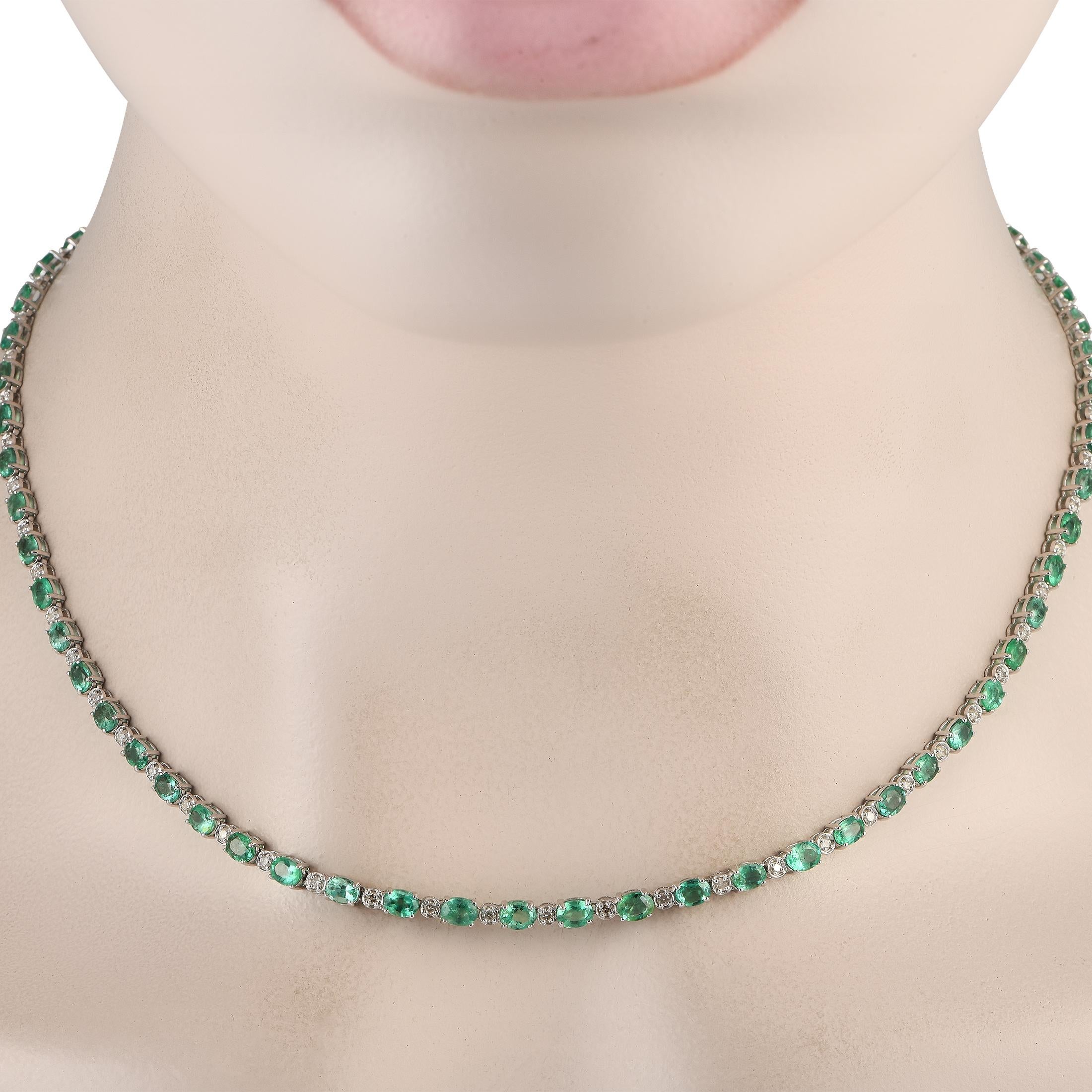 Captivating Emeralds with a total weight of 10.05 carats alternate with 0.90 carats of sparkling Diamonds on this impeccably crafted necklace. This piece measures 17 long and features a simple setting crafted from 18K White Gold.This jewelry piece