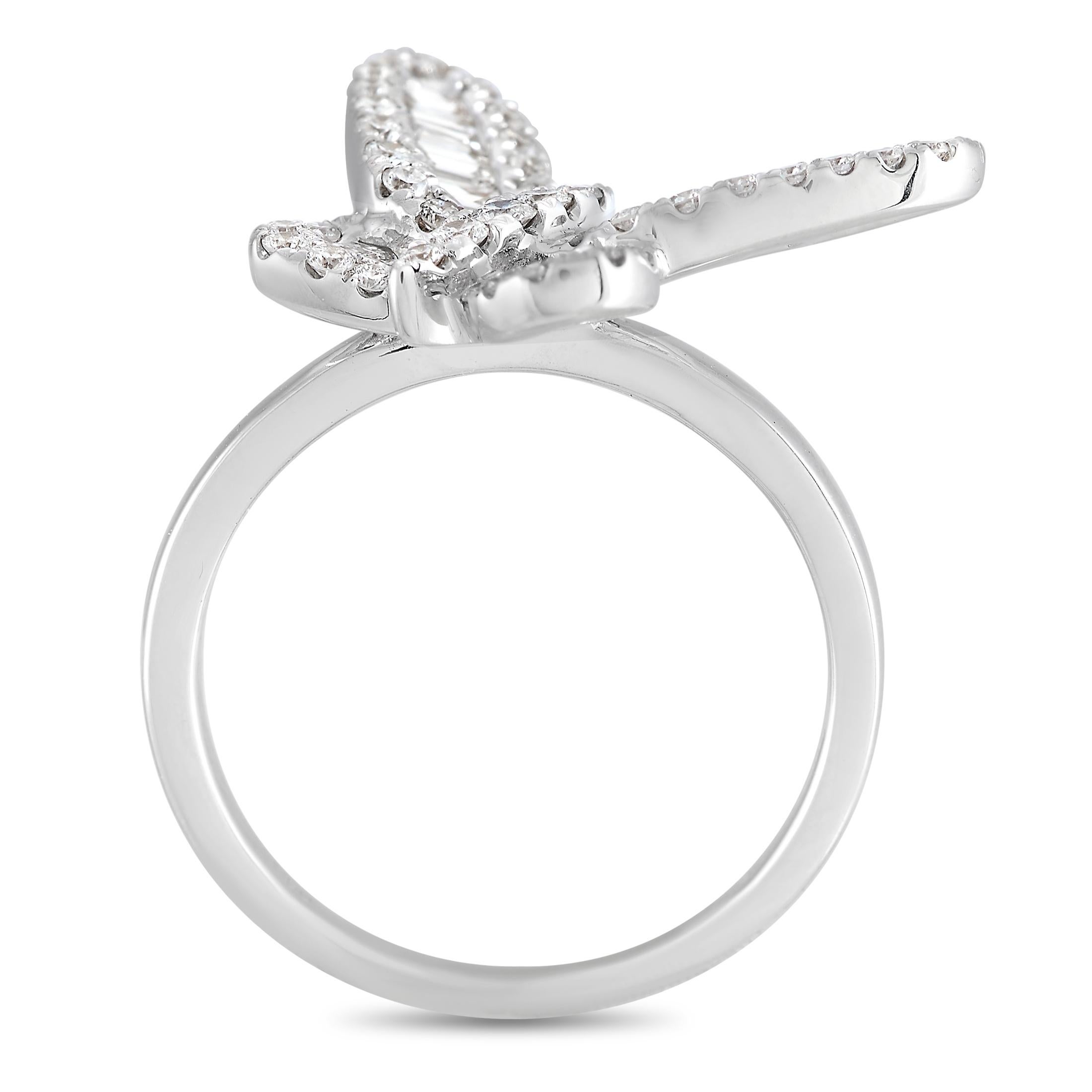 This charming ring is both luxurious and whimsical. Perched atop a 2mm wide band, you’ll find a 18K White Gold butterfly. It’s accented by an array of sparkling diamonds, including 0.58 carats of diamond baguettes and round cut diamonds totaling
