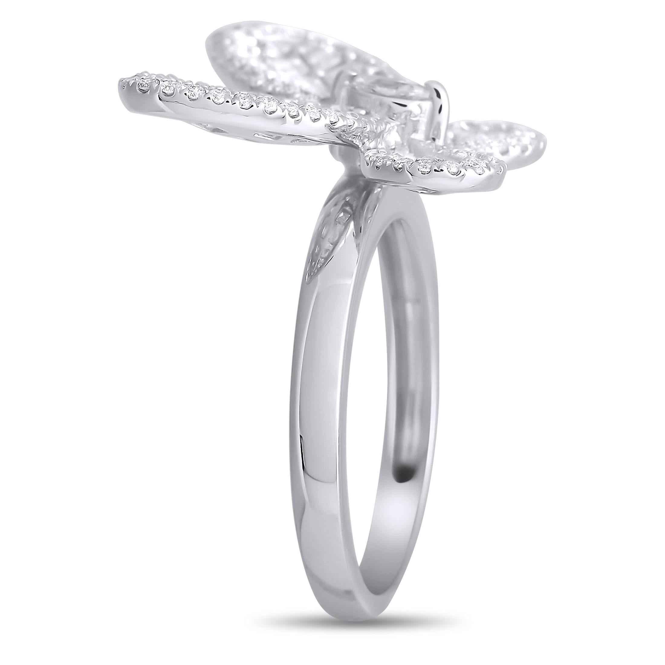 This pretty butterfly ring features a band that is made with 18K white gold, highlighting a butterfly set with a single marquise diamond in the center. 0.30 carats of Round diamonds outline the wings, and 0.91 carats of asscher diamonds fill in the
