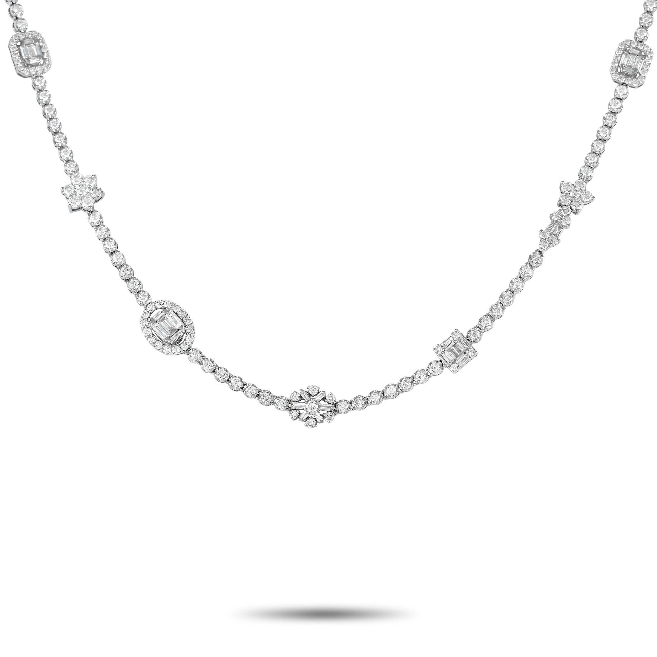 This lovely LB Exclusive necklace is a timeless piece. The necklace is made with 18K white gold and set with a single row of diamonds over its length. The chain is also punctuated with evenly spaced diamond clusters for a total of 12.15 carats of