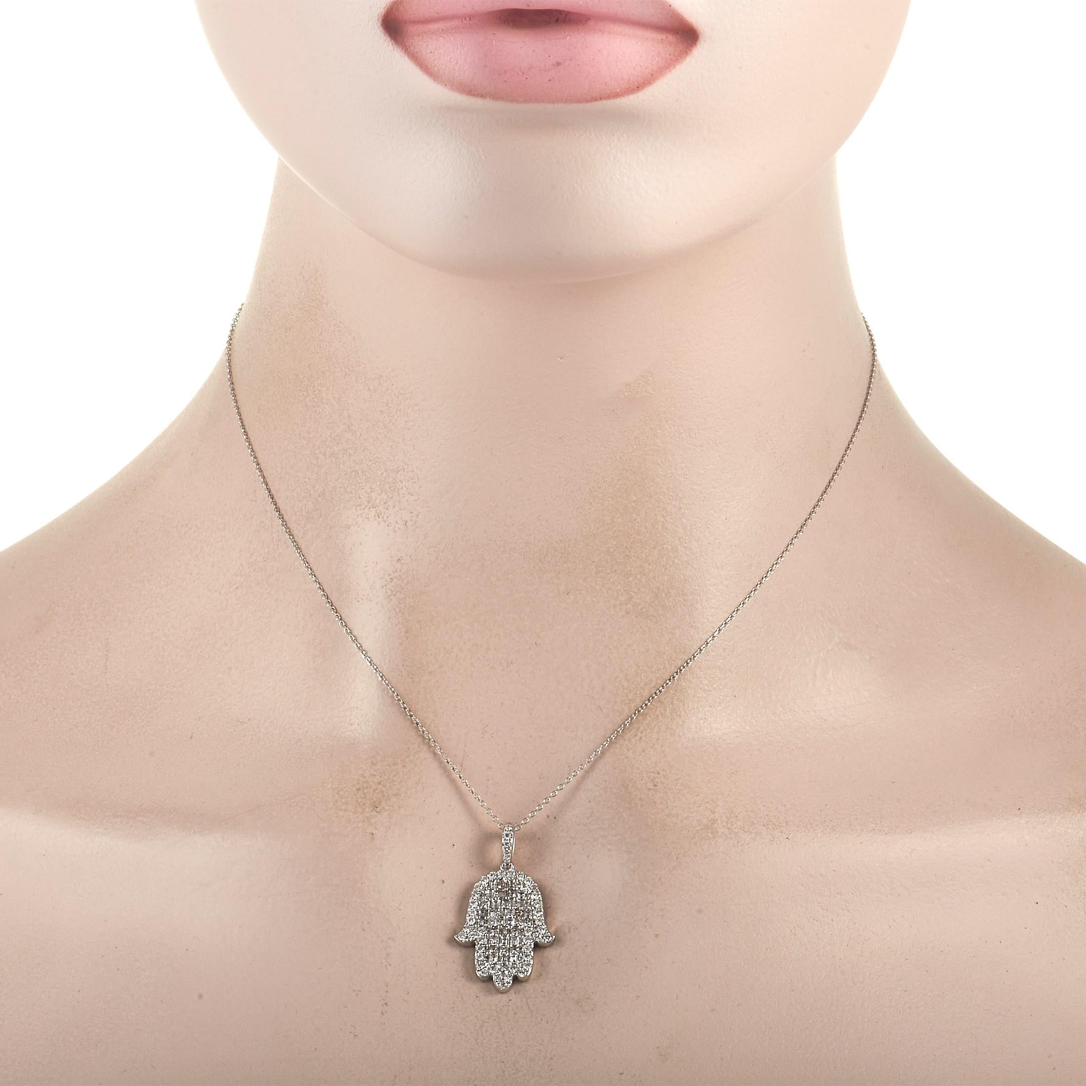 Here is a sparkly and lucky accessory to add to your jewelry box. The LB Exclusive 18K White Gold 1.23 ct Diamond Hamsa Necklace features a 16-inch long white gold chain holding a white gold palm-shaped pendant adorned with 0.52 ct round diamonds