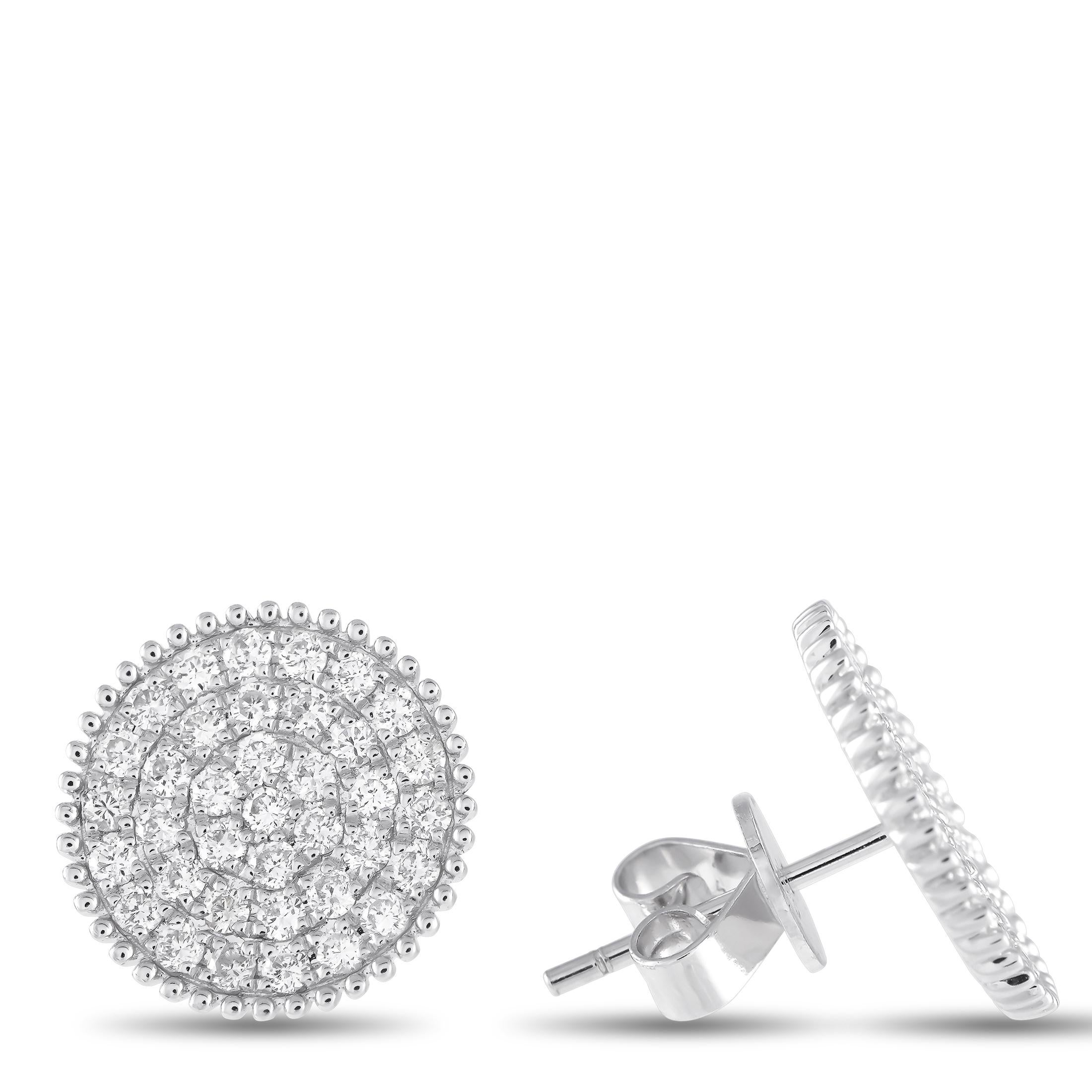 These circular earrings will add a touch of luxury to absolutely any ensemble. Crafted from 18K White Gold, the perimeter of the design is elevated by beadwork while the interior is covered in sparkling Diamonds with a total weight of 1.30 carats.