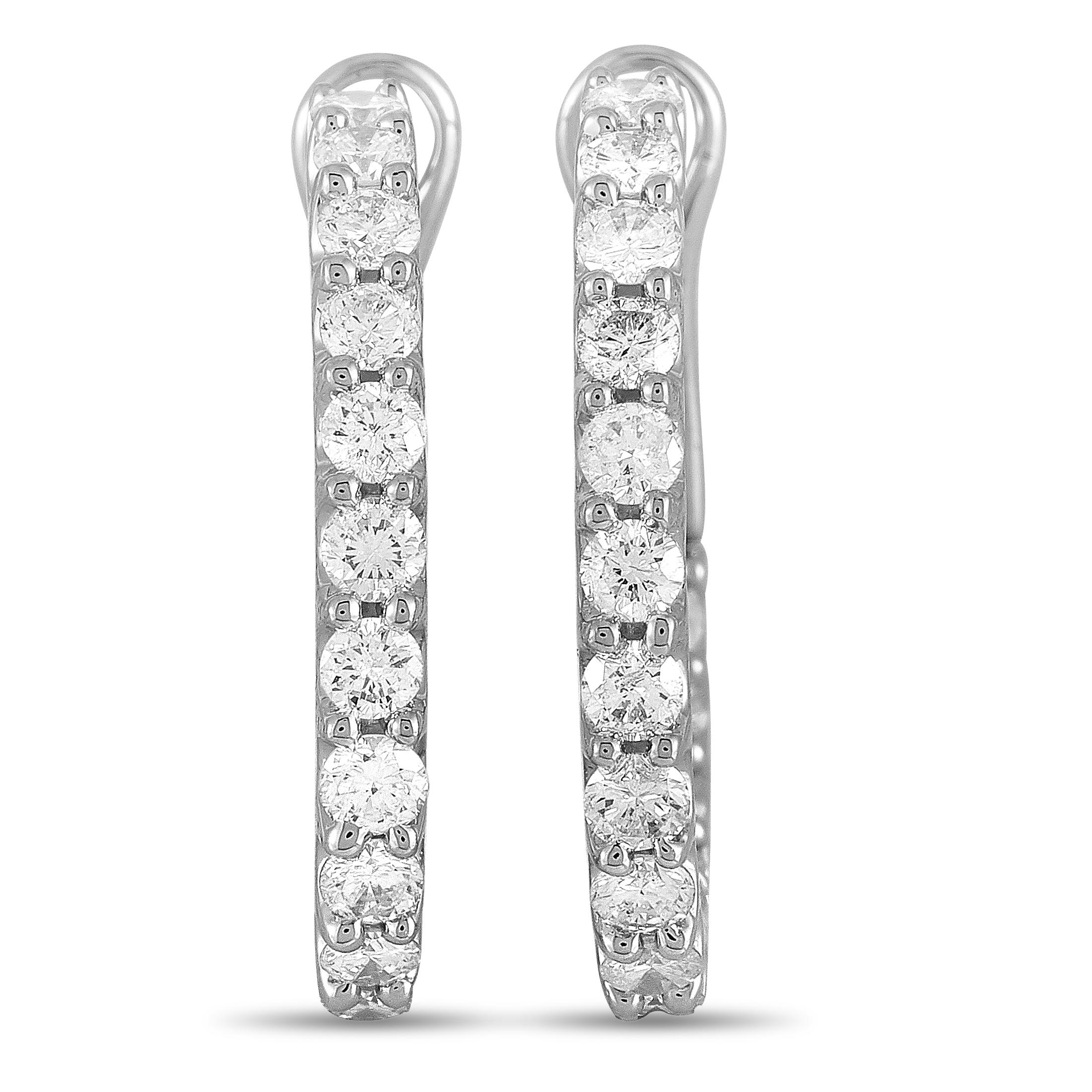 These LB Exclusive earrings are made out of 18K white gold and diamonds that total 1.50 carats. The earrings measure 1.87” in length and 0.75” in width, and each of the two weighs 3.1 grams.

The pair is offered in brand new condition and includes a