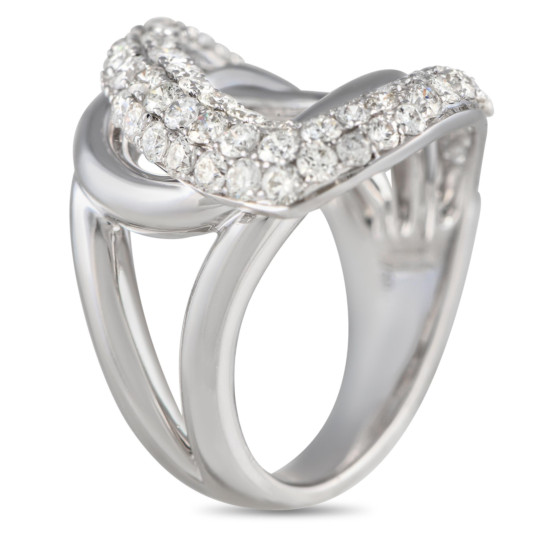 Sleek and incredibly sophisticated, this impeccable ring features a uniquely elegant 18K White Gold setting. The beautifully curved lines are only elevated by the series of sparkling diamonds, which together possess a total weight of 1.55 carats.
