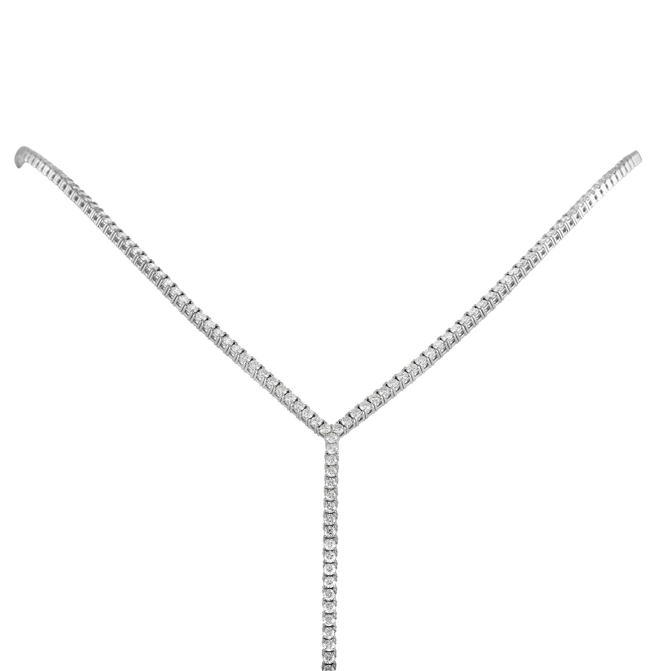This LB Exclusive 18K White Gold 15.71 ct Diamond Dangle Necklace is an eye-catching piece. The necklace is made with sleek 18K white gold and set with a 15.71-carat row of small round cut diamonds over its length. Each diamond is held in place by