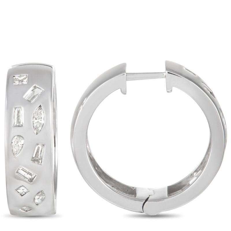 Bold and incredibly contemporary, these hoop earrings will serve as a unique addition to any fine jewelry collection. Set within an 18K White Gold setting measuring 1” round, you’ll find an array of inset diamonds that possess a total weight of 1.60