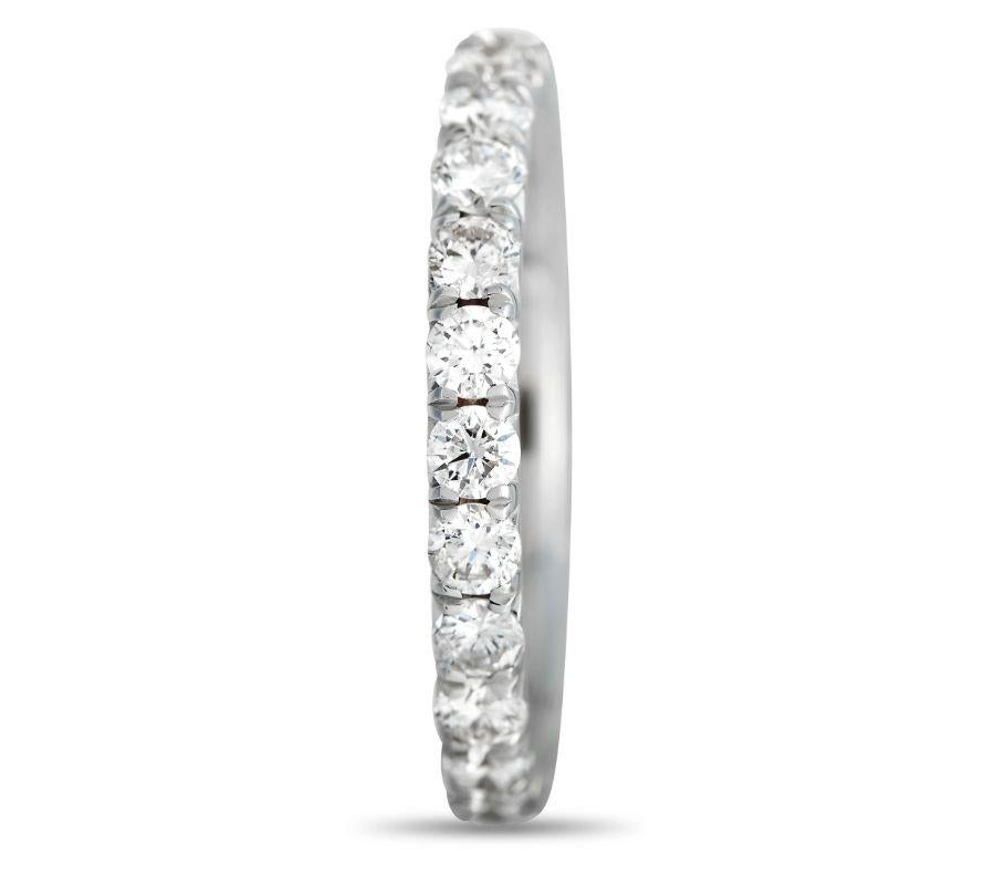 Sparkling diamonds totaling 1.75 carats cover the entirety of this stylish ring’s sleek 18K white gold setting. This piece measures 3mm wide, making it ideal for everyday wear. 
 
 This jewelry piece is offered in brand new condition and includes a