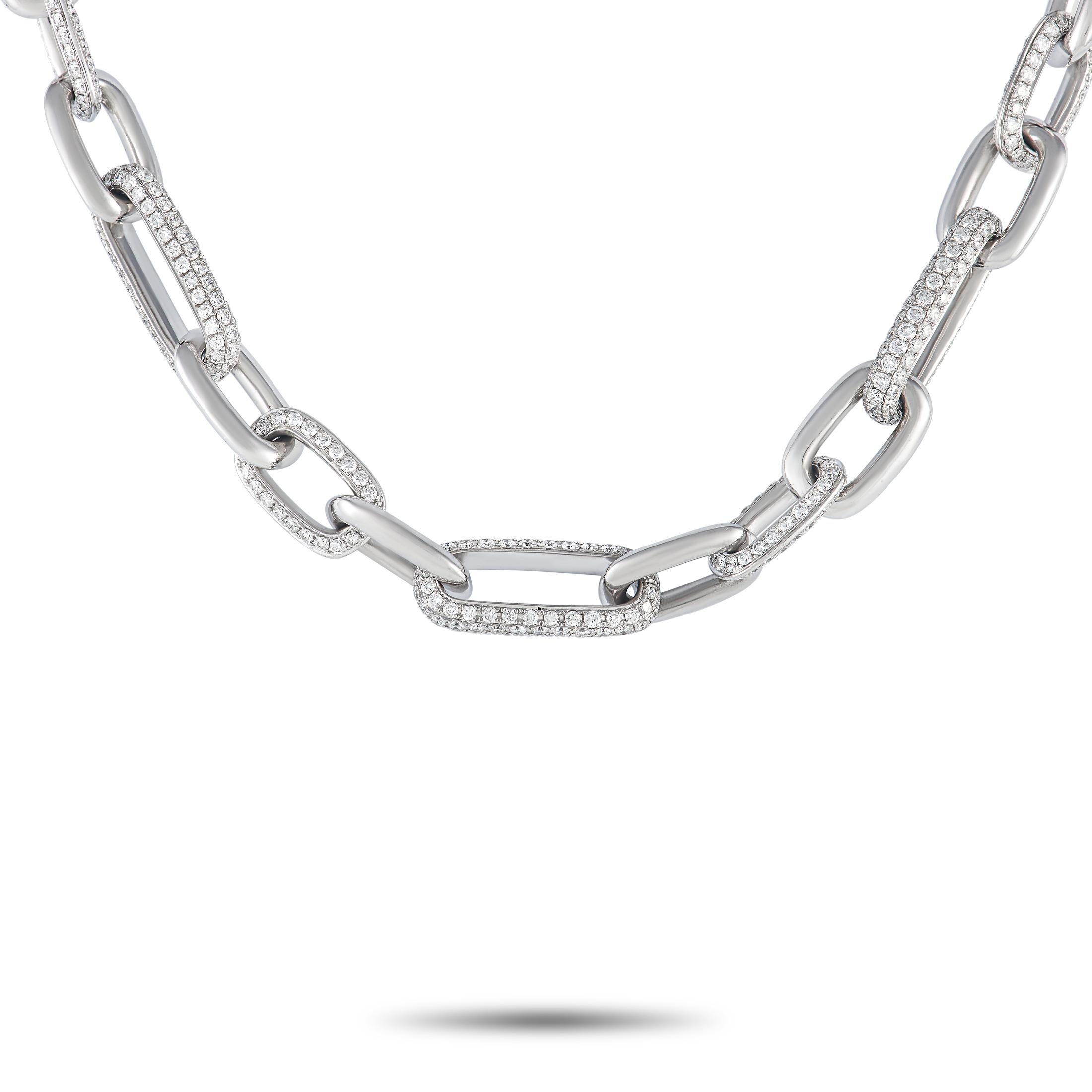 Dress up any outfit effortlessly through the edgy style and sparkle of this link necklace. This piece features a 20-inch long chain of oval links, in alternating solid white gold and diamond-encrusted links. This versatile and luxurious neck