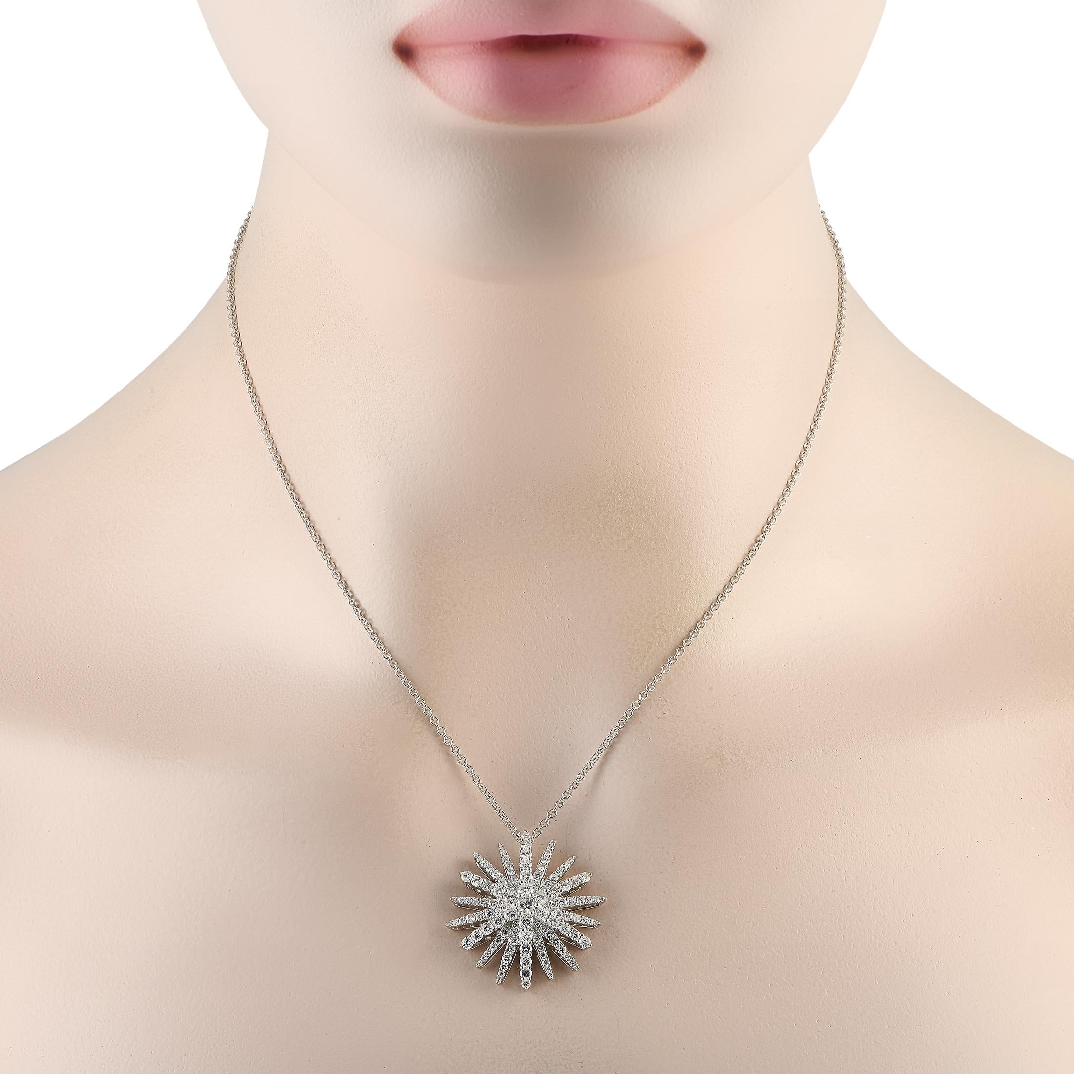 Here is a shiny, sparkly sunburst necklace to celebrate the ray of sunshine that she is. This necklace makes a fantastic special occasion gift. It features a white gold chain holding a 1.15-wide pendant in sun motif. The 18K white gold pendant
