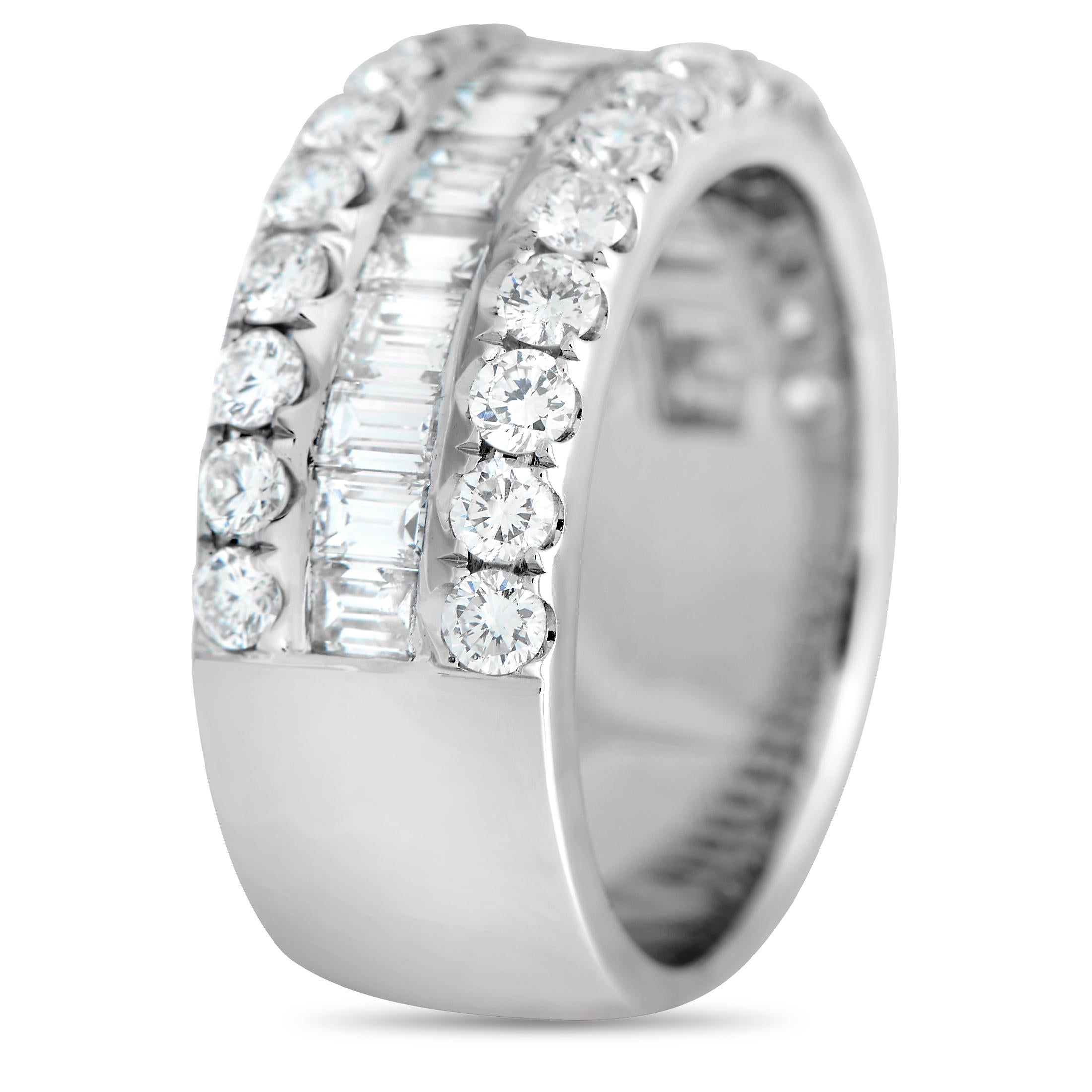 This ring is nothing short of elegant. It has a 7mm-thick band in 18K white gold, traced at the top center with channel-set step-cut diamonds. The edges are traced with rows of round diamonds that shine with poised sparkle. The ring's top dimensions