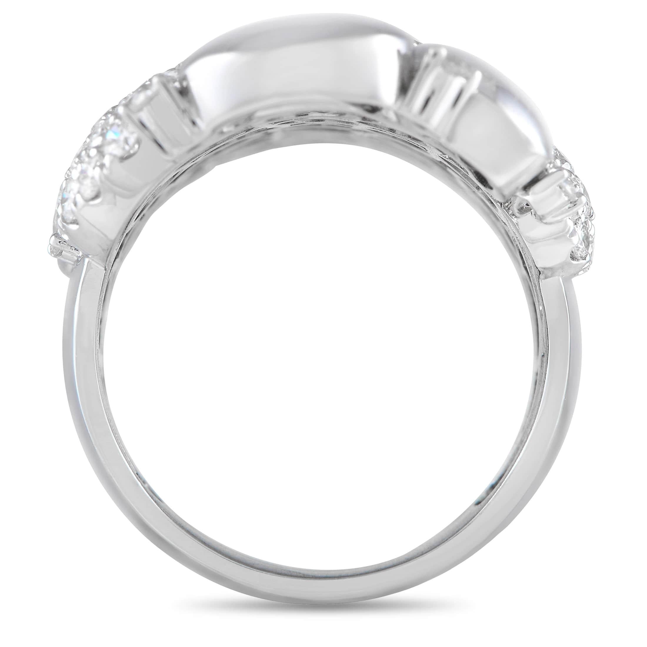 Shimmering 18K White Gold accents and inset diamonds totaling 2.50 carats pair together beautifully on this uniquely elegant ring. This bold, dynamic design features an 8mm wide band and a 3mm top height, meaning it will feel comfortable on the hand
