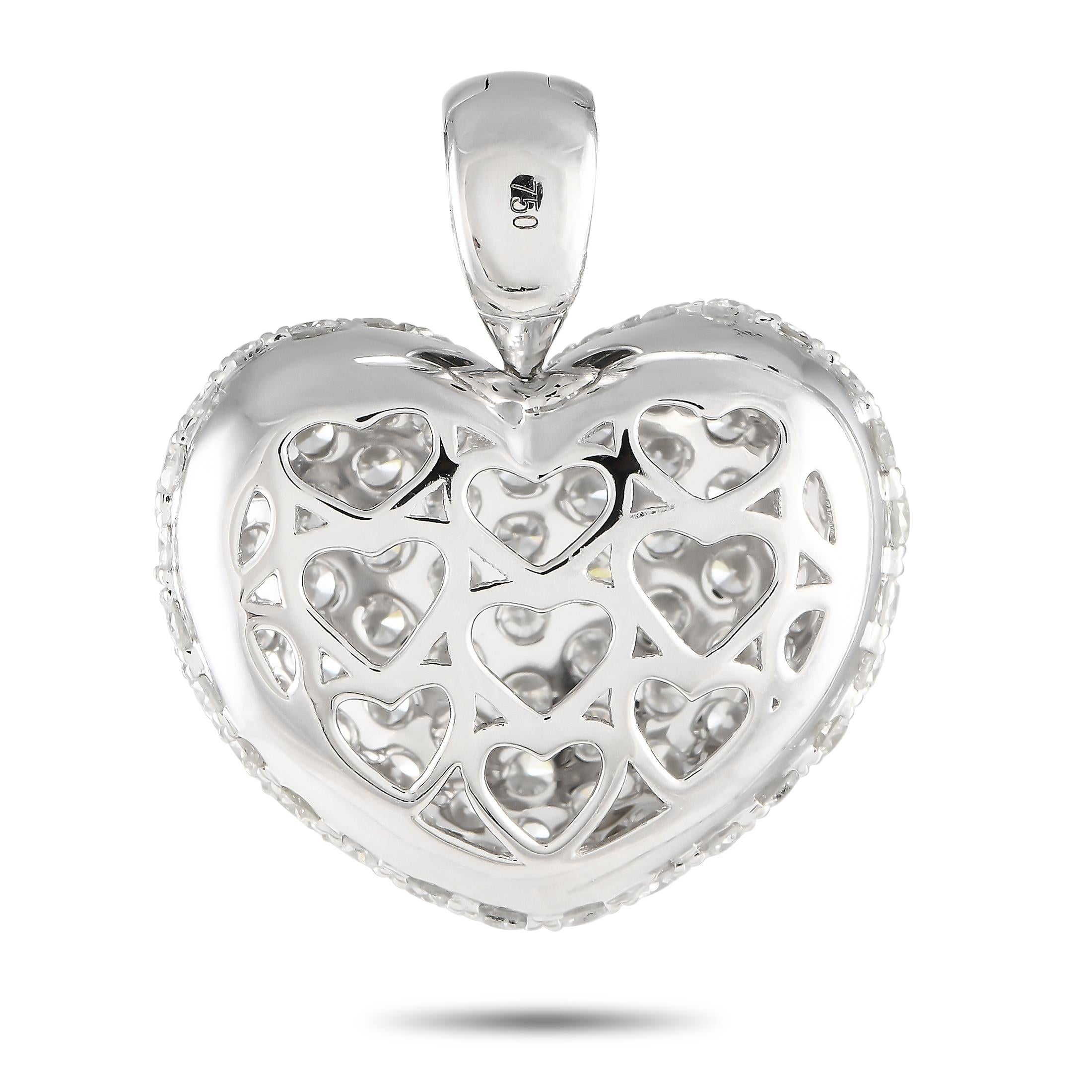 A forever classic, perfect for the one who has your heart forever. Here is a heart-shaped pendant shimmering wiht multiple rows of round, brilliant diamonds. The pendant measures 0.85 x 0.75\
