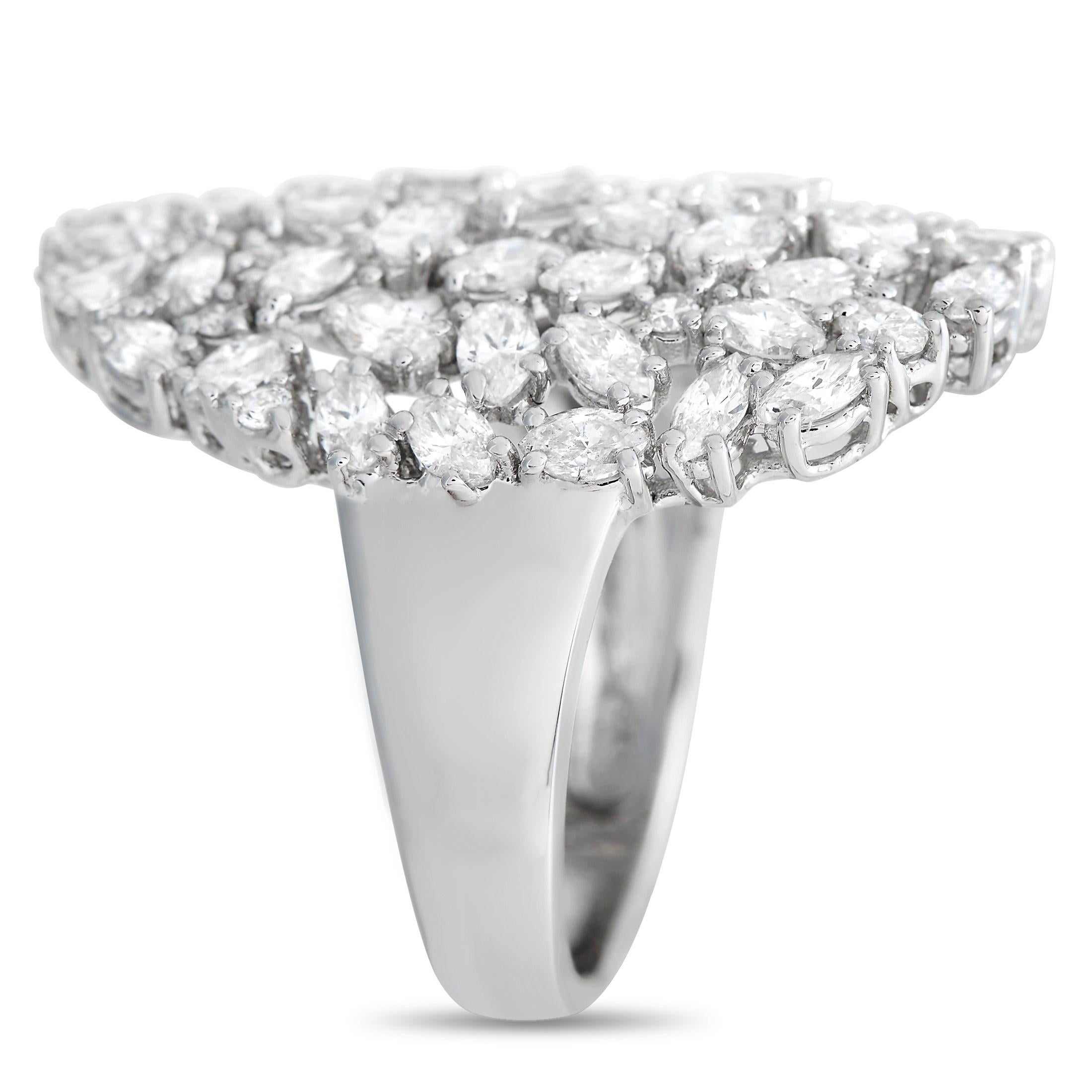 A creative arrangement of diamonds totaling 2.94 carats allows this 18K White Gold ring to effortlessly radiate light. It features a 4mm wide band and a 2mm top height, meaning this statement-making piece is also incredibly wearable.

This jewelry