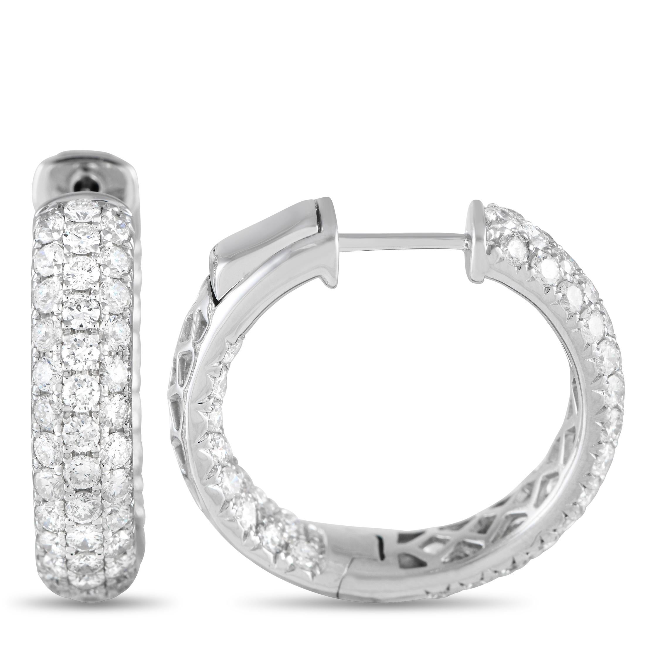 These hoops are packed with sparkle. Along the inner back and outside surface of each hoop are three rows of diamonds that shimmer with elegance. Each hoop measures 0.85