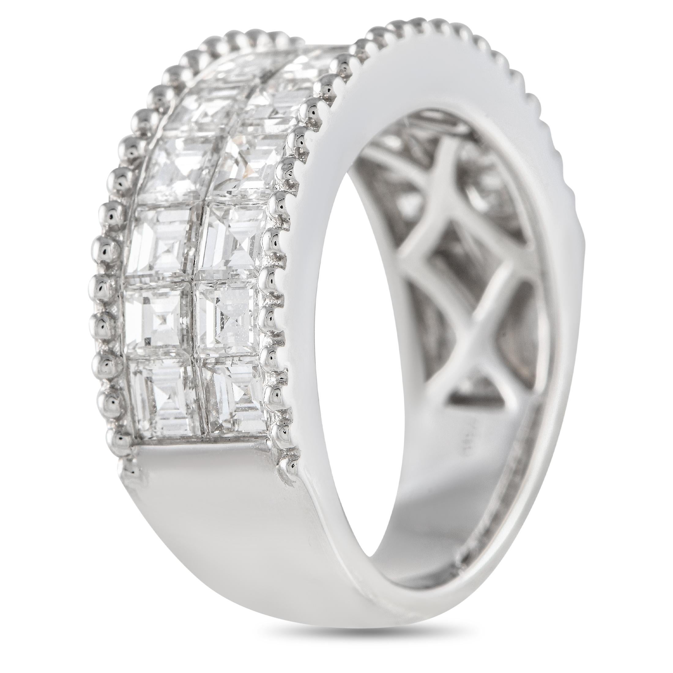 Despite its understated design, this 18K White Gold band ring is filled with dynamic details. Millegrain accents elevate the perimeter, while square-cut diamonds with a total weight of 3.0 carats add a touch of luxury to the center. This timeless