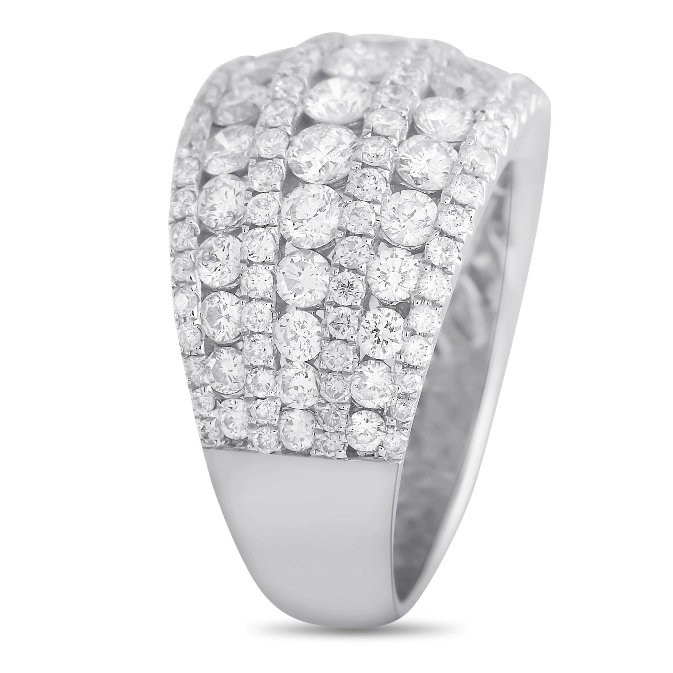 Multiple rows of diamonds totaling 3.18 carats make this ring sparkle and shine every time it catches the light. Crafted from opulent 18K White Gold, it includes a 4mm wide band and a 3mm top height. 
 
 This jewelry piece is offered in brand new