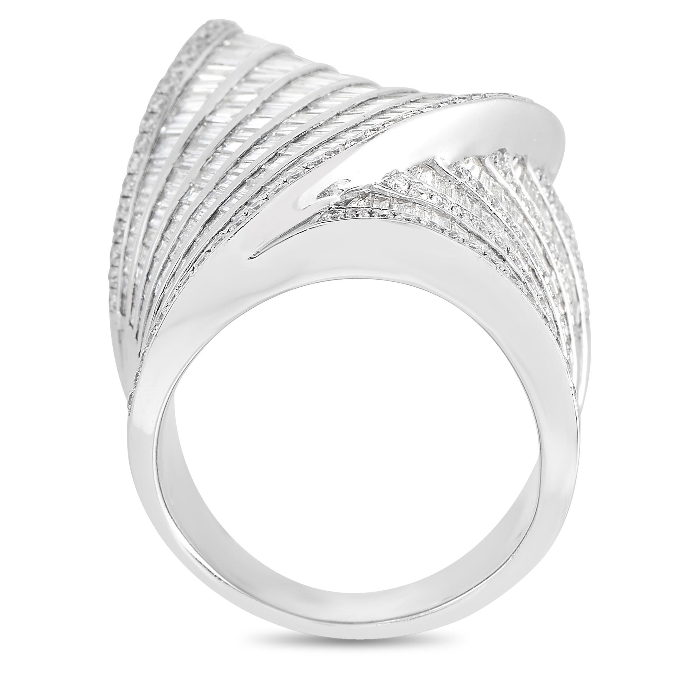 Boasting a chic and modern design, this LB Exclusive ring is crafted with 18K white gold and studded with brilliant diamonds that total 4.7 carats. It features a band thickness of 8 mm and a top height of 6 mm, while its top dimensions measure 27 by