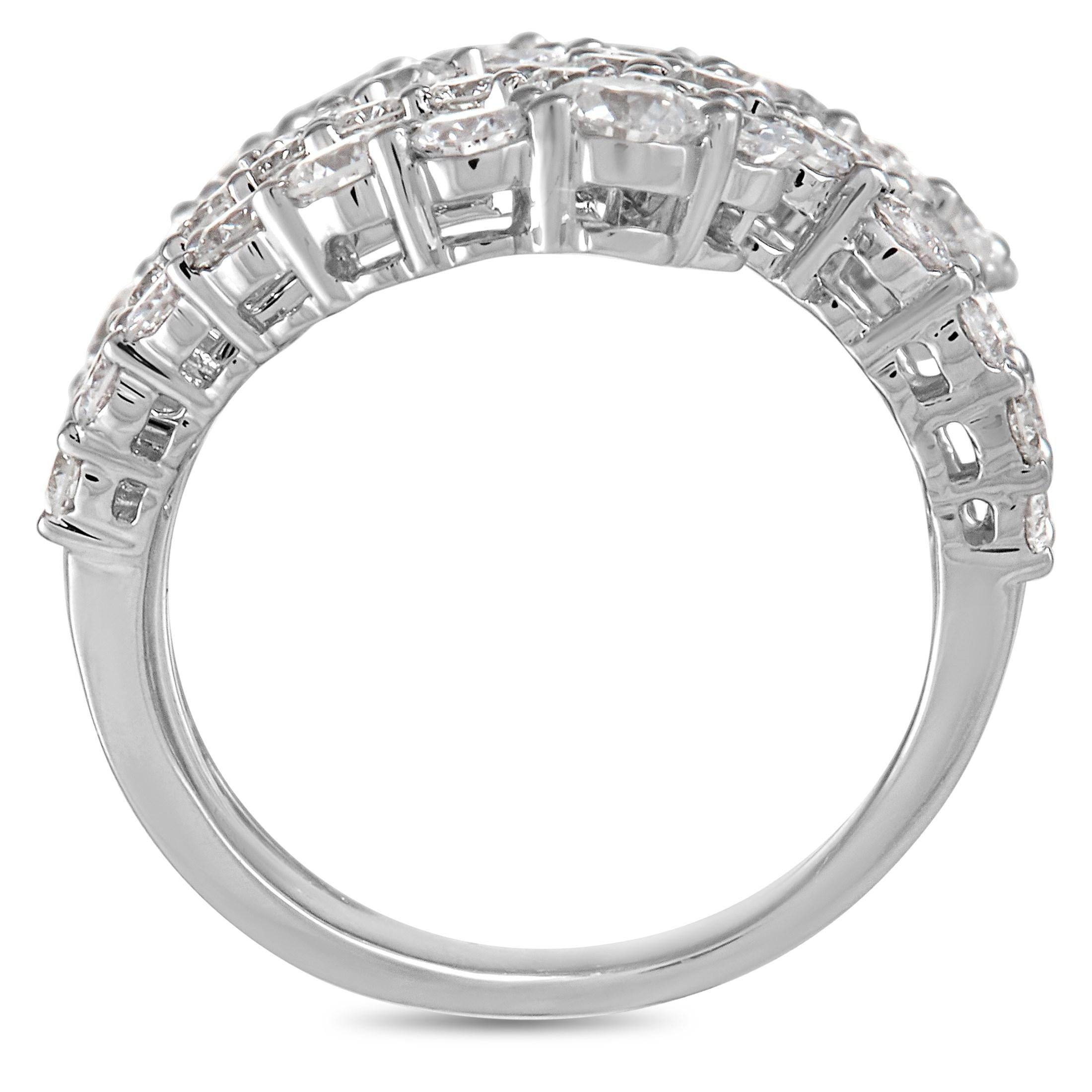 A stunning, curved setting made from 18K White Gold makes this luxury ring simply unforgettable. Adorned with 5.0 carats of sparkling diamonds, this artistic accessory features a 10mm wide band and a top height measuring 3mm.

This jewelry piece is
