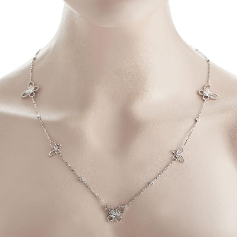 This exceptional necklace is delicate, dramatic, and incredibly charming. A 36” long chain comes to life thanks to a series of intricately crafted butterfly accents. Shimmering 18K white gold perfectly showcases the dazzling array of diamonds, which