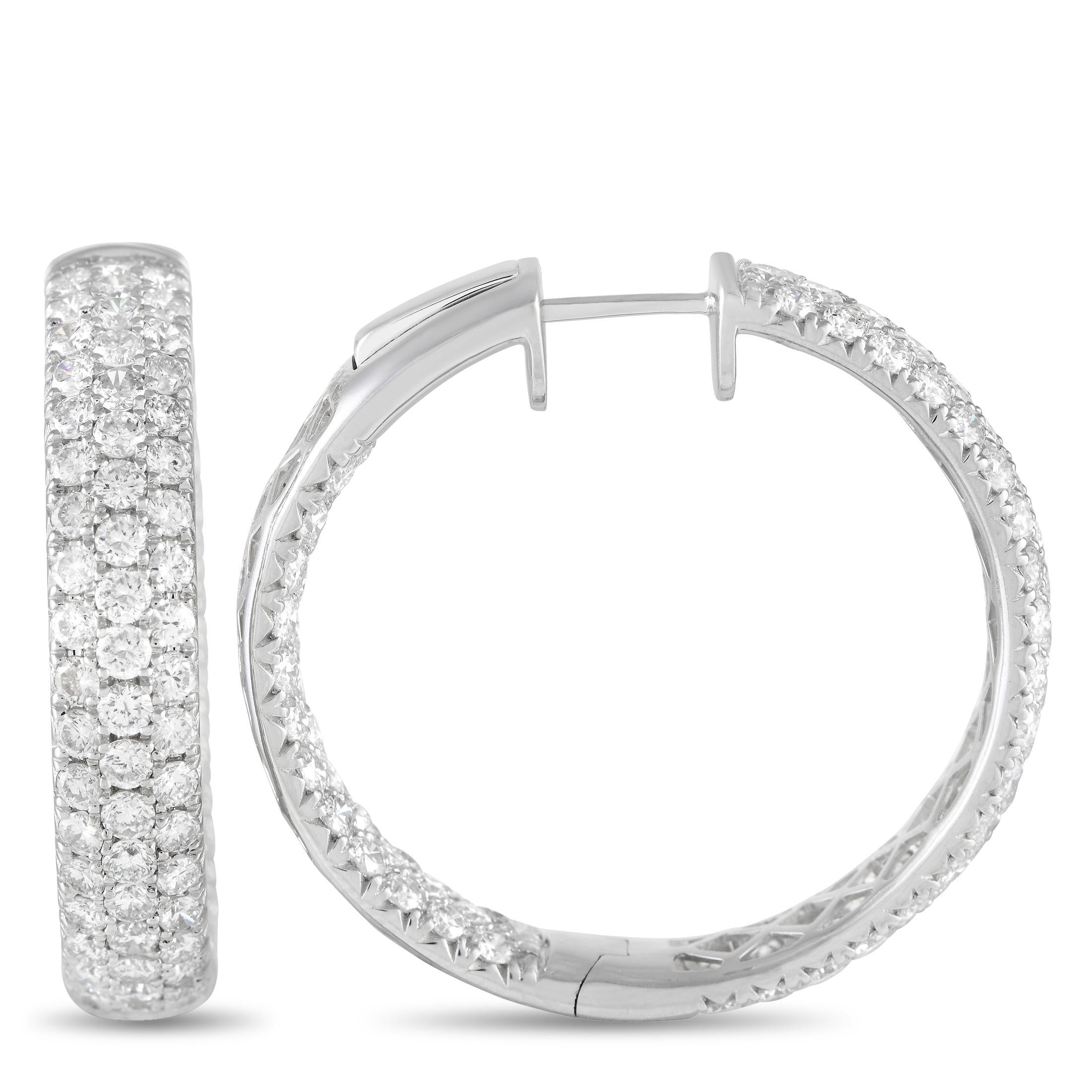 These hoops promise maximum sparkle. Each white gold hoop earring measures 1.25