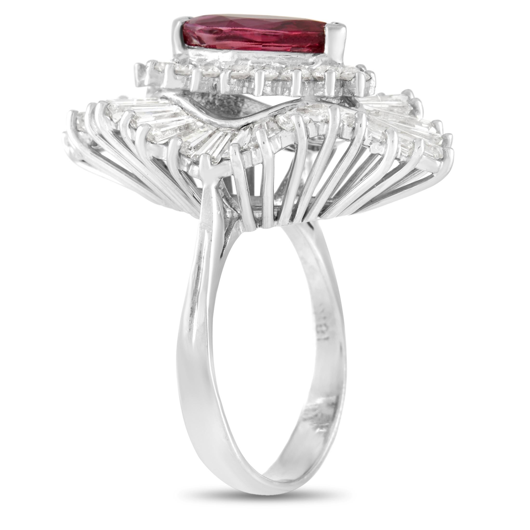 This gorgeous LB Exclusive 18K White Gold 5.50 ct Diamond 1.70 ct Ruby Ring was made with 18K white gold and set with a total of 5.50 carats of baguette cut and round cut diamonds forming a halo around the 1.70 carat oval cut ruby center stone. The