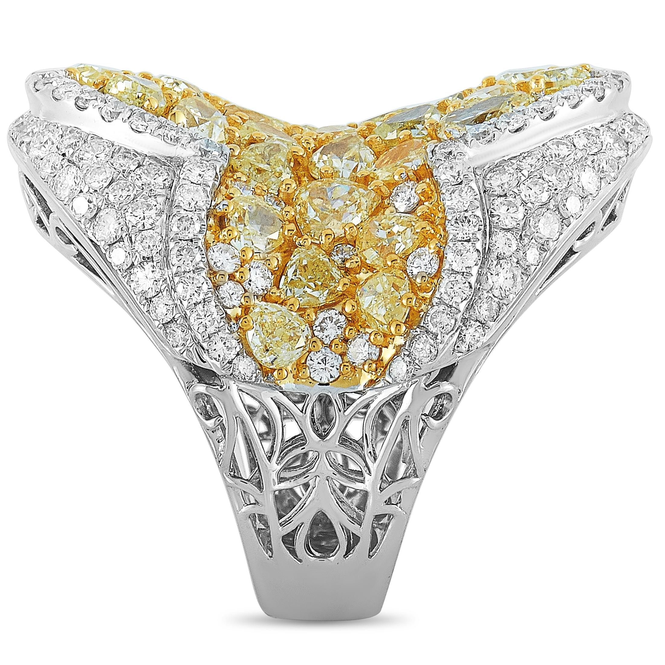This LB Exclusive ring is crafted from 18K white gold and set with white and yellow diamonds that total 2.06 and 5.03 carats respectively. The ring weighs 18.3 grams and boasts band thickness of 5 mm and top height of 8 mm, while top dimensions