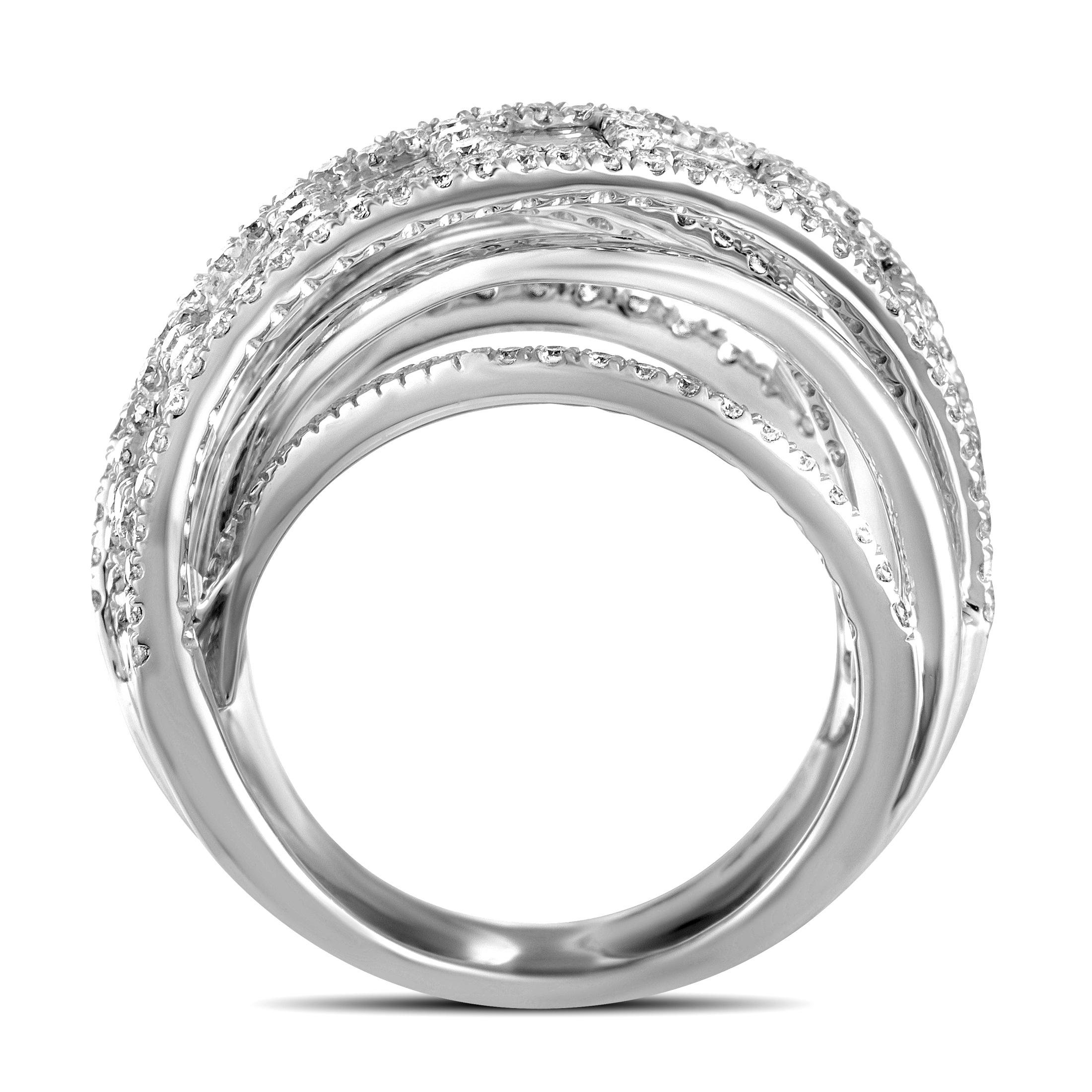 This LB Exclusive ring is crafted from 18K white gold and weighs 12.5 grams, boasting a total of 3.30 carats of diamonds (1.14 carats of round ones and 2.16 carats of baguette ones). Band thickness and ring top height measure 8 and 8 mm