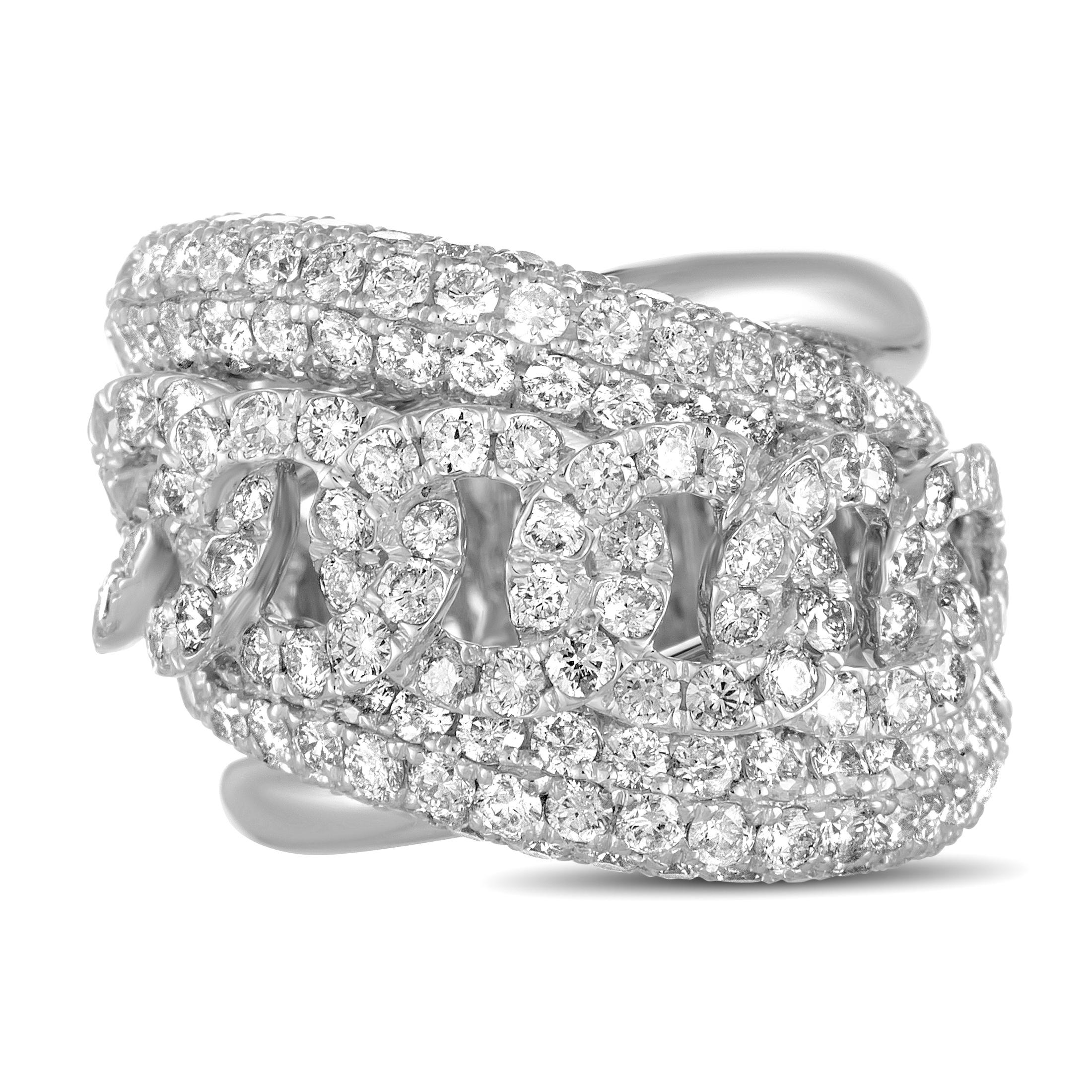 This LB Exclusive ring is crafted from 18K white gold and weighs 15.5 grams, boasting a total of 4.80 carats of diamonds. Band thickness and ring top height measure 10 and 8 mm respectively, while ring top dimensions are 18 by 25 mm.

Offered in