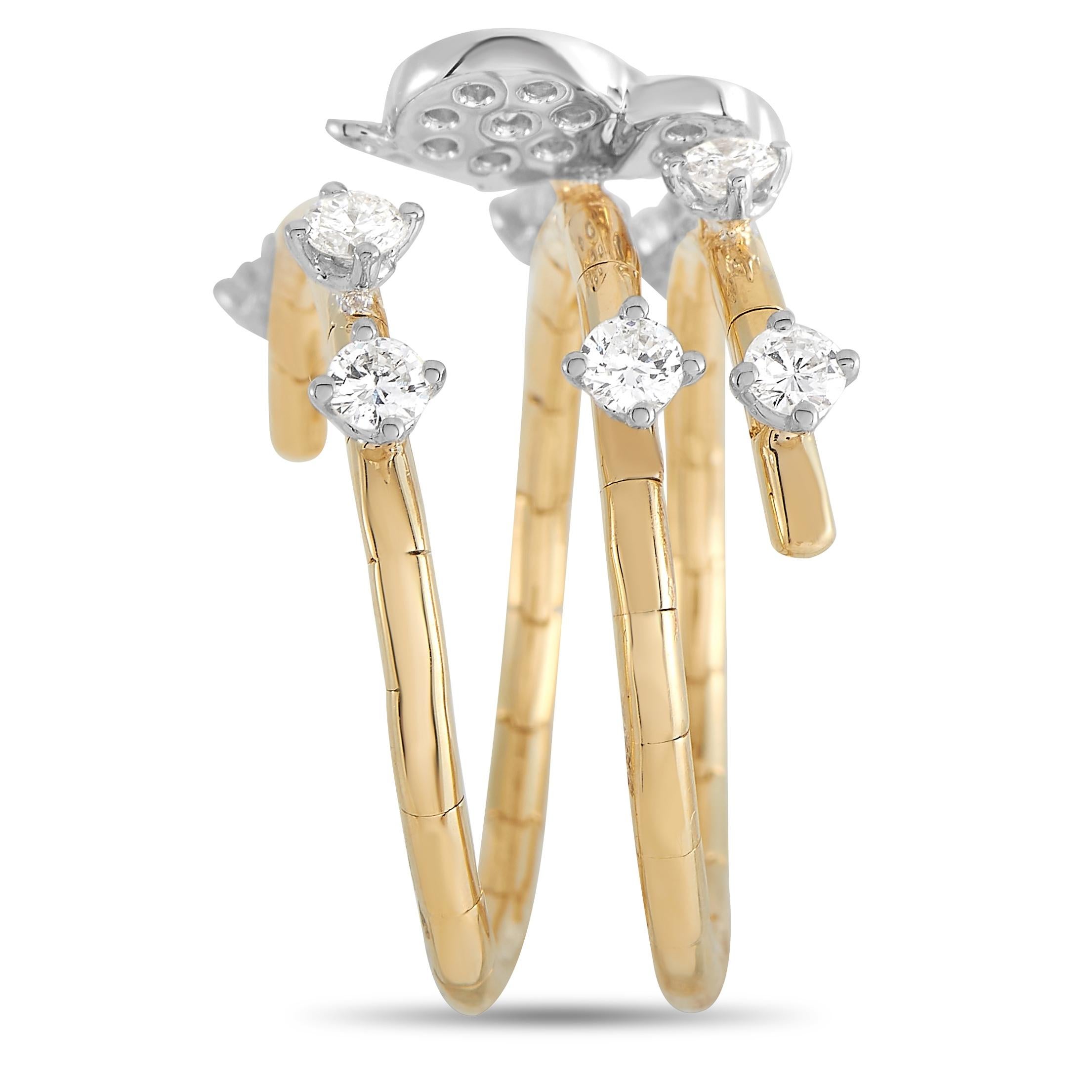 Contrasting metals and charming butterfly accents make this a ring that will continually capture your imagination. This piece includes a sleek 18K Yellow Gold band that wraps around the finger. At the top, you’ll find butterfly accents crafted from