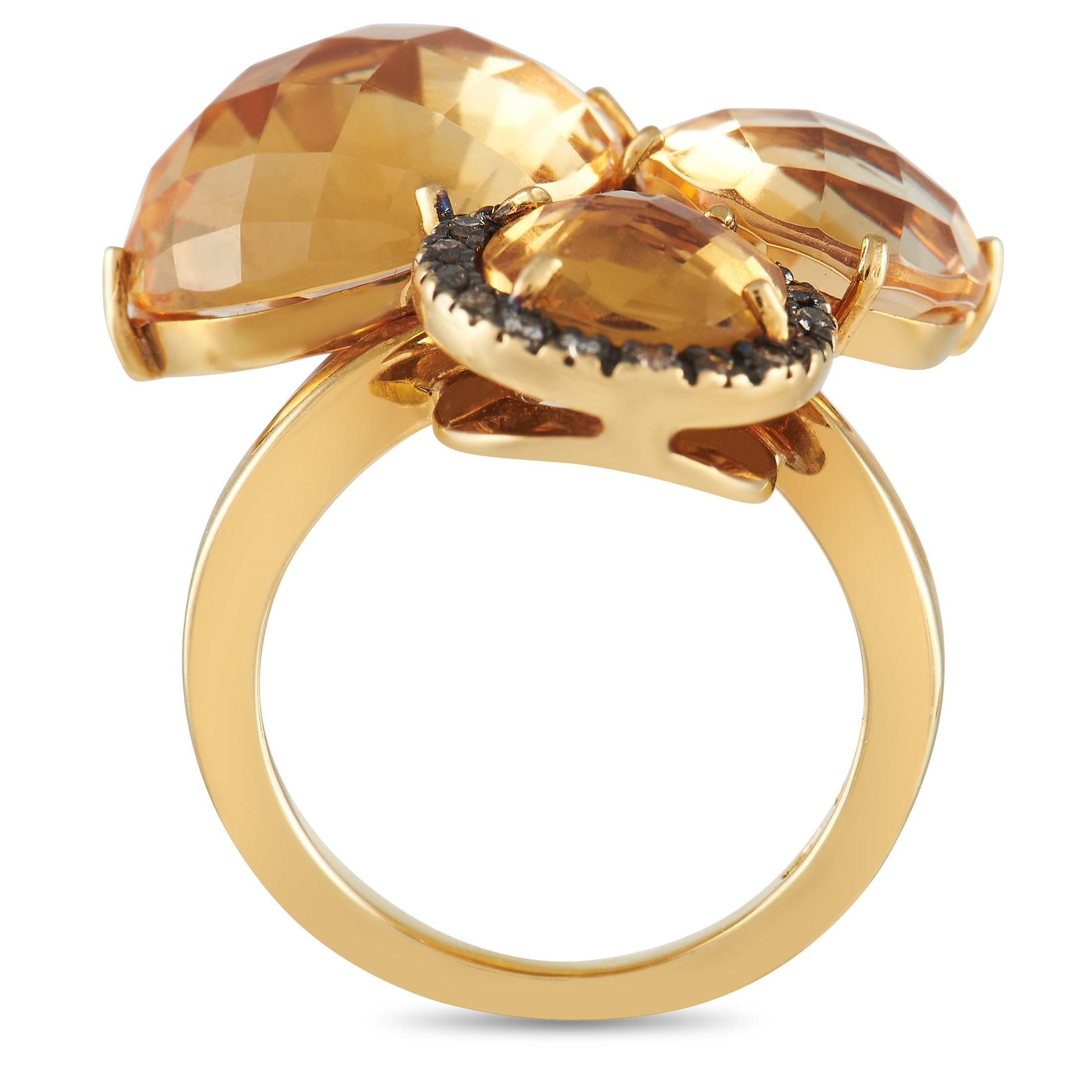 A cluster of stunning, multifaceted Citrine gemstones makes this elegant ring simply unforgettable. Sparkling diamond accents totaling 0.12 carats add extra shine to this exquisitely styled piece, which features a delicate 1mm band and a dramatic