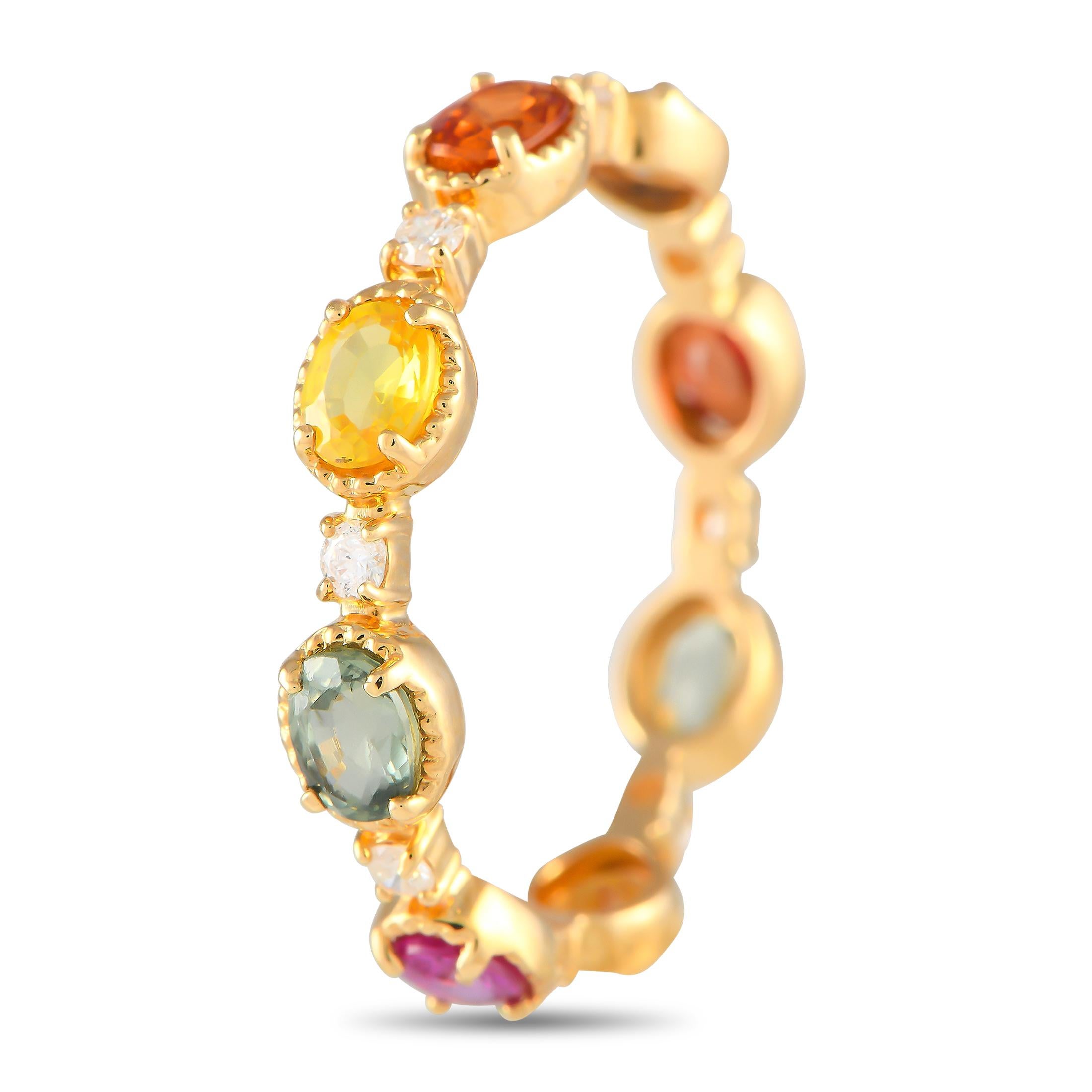Warm-toned multicolored sapphires with a total weight of 1.75 carats beautifully elevate this rings understated 18K yellow gold setting. Diamonds with a total weight of 0.16 carats add a touch of sparkle to this unforgettable accessory. It features