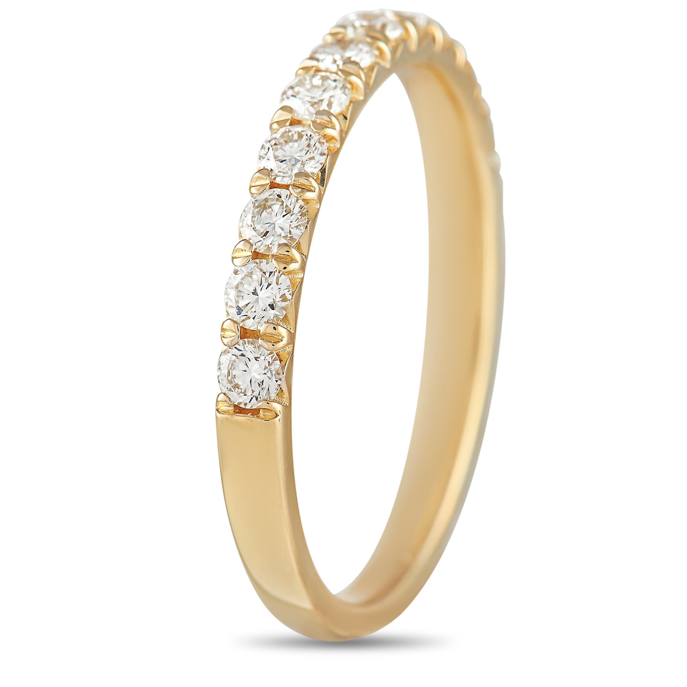 Opulent 18K Yellow Gold provides a stunning foundation for this elegant, understated ring. The 2mm wide band comes to life thanks to a series of sparkling diamonds with a total weight of 0.49 carats. A 2mm top height makes it a highly wearable piece
