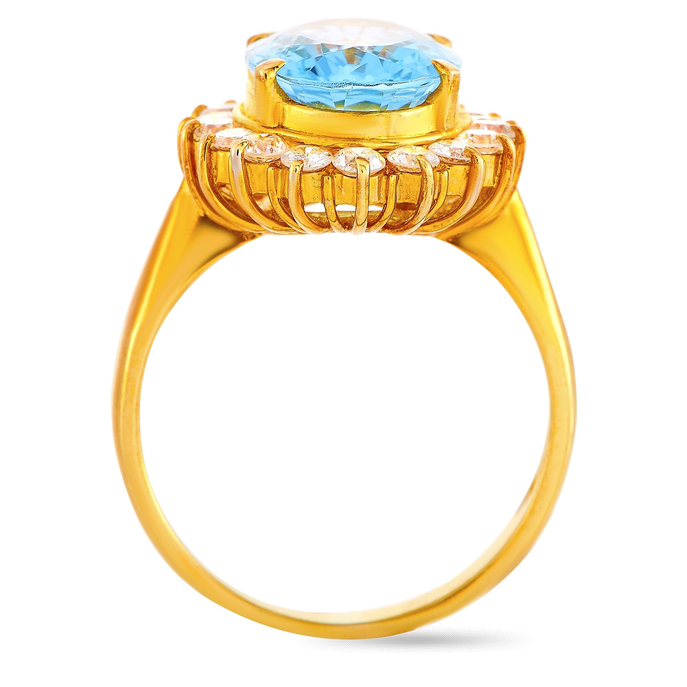 This LB Exclusive ring is crafted from 18K yellow gold and weighs 6.1 grams. It boasts band thickness of 3 mm and top height of 7 mm, while top dimensions measure 16 by 14 mm. The ring is set with a topaz that weighs 3.26 carats and with diamonds