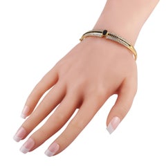 LB Exklusives Armband aus 18 Karat Gelbgold mit 0,75 Karat Diamanten und Saphiren