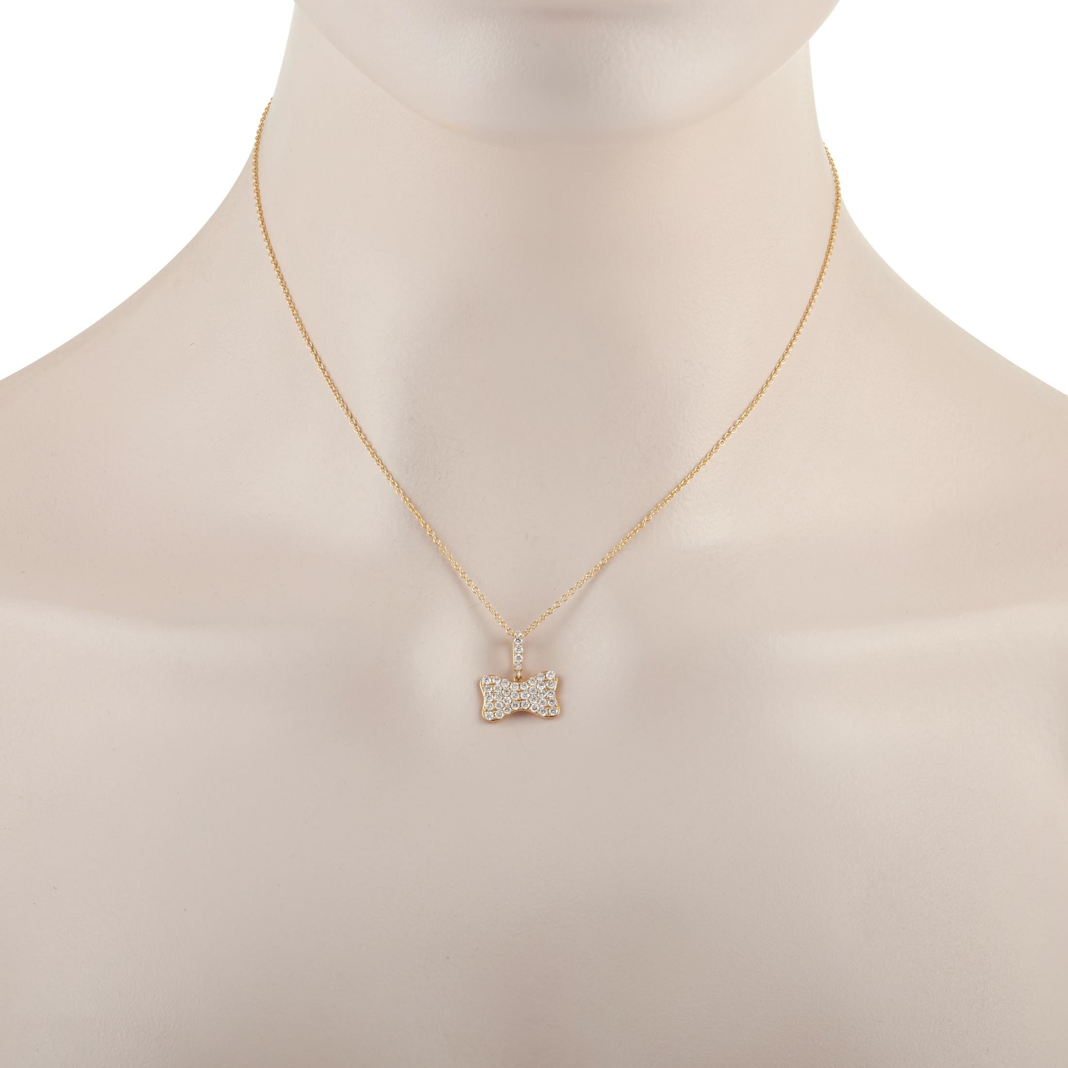 This cute LB Exclusive 18K Yellow Gold 0.80 ct Diamond Bow Pendant Necklace is made with an 18K yellow gold chain and features a yellow gold bow shaped pendant set with round diamonds measuring 0.80 carats. The dainty 18K yellow gold chain measures