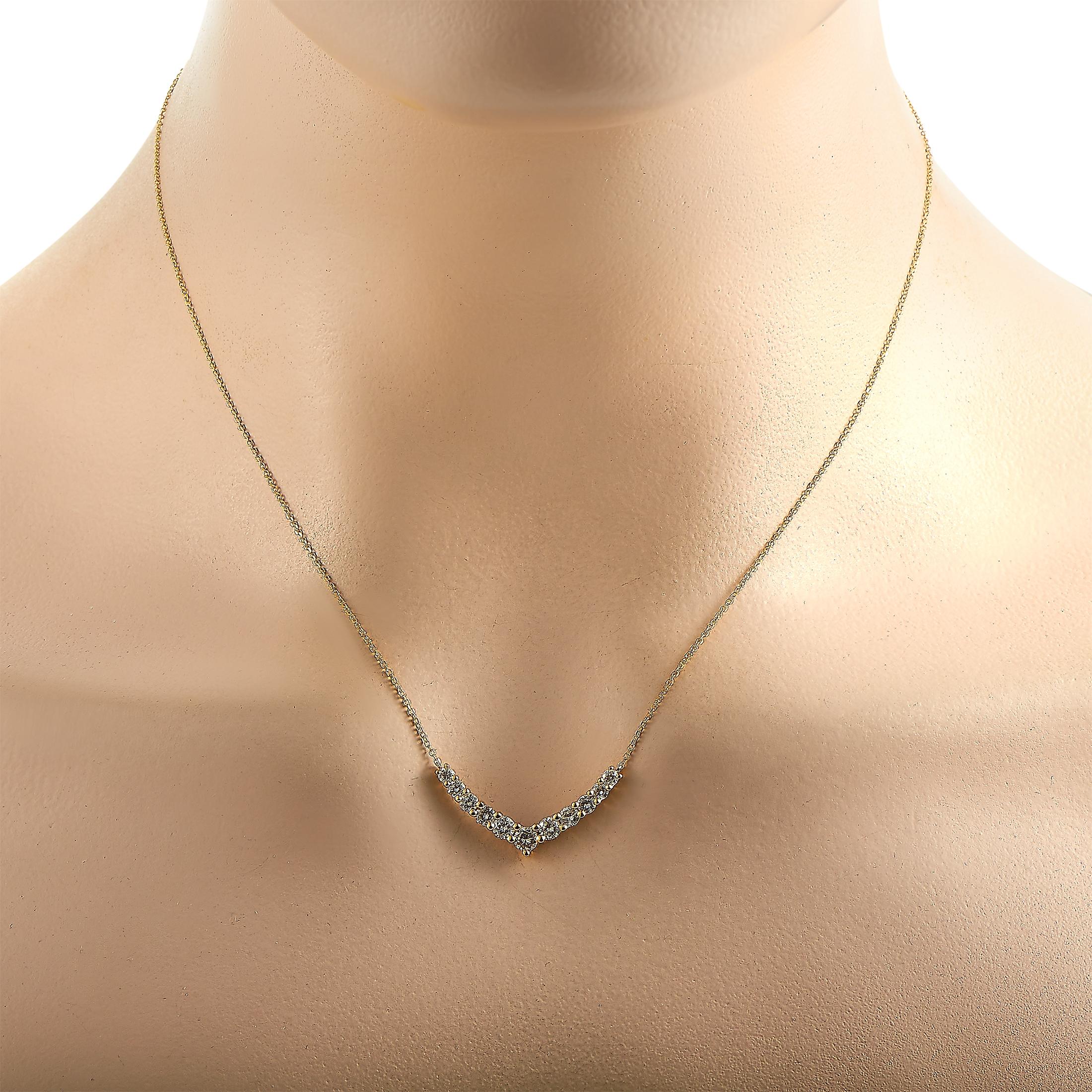 This LB Exclusive necklace is crafted from 18K yellow gold and weighs 3.3 grams. It is presented with a 16” chain and a pendant that measures 0.65” in length and 1” in width. The necklace is embellished with diamonds that total 1.00 carat.
 
