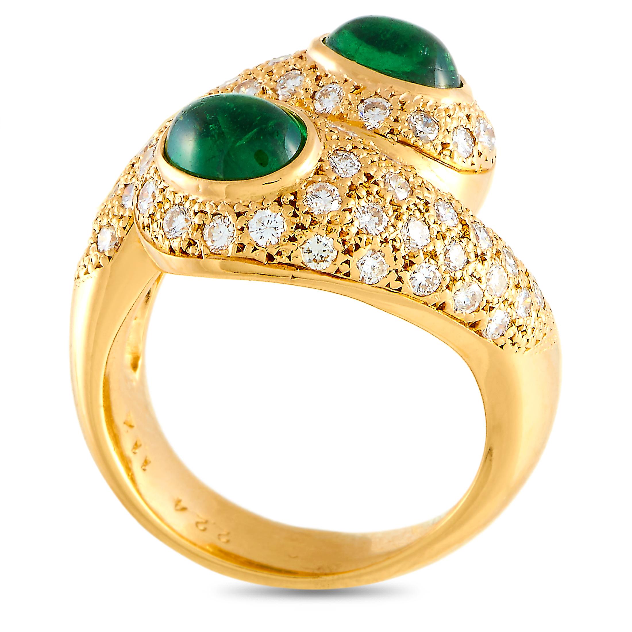 This LB Exclusive ring is crafted from 18K yellow gold and weighs 13.7 grams, boasting band thickness of 6 mm and top height of 7 mm, while top dimensions measure 22 by 17 mm. The ring is set with diamonds and tsavorites that total 1.12 and 2.24