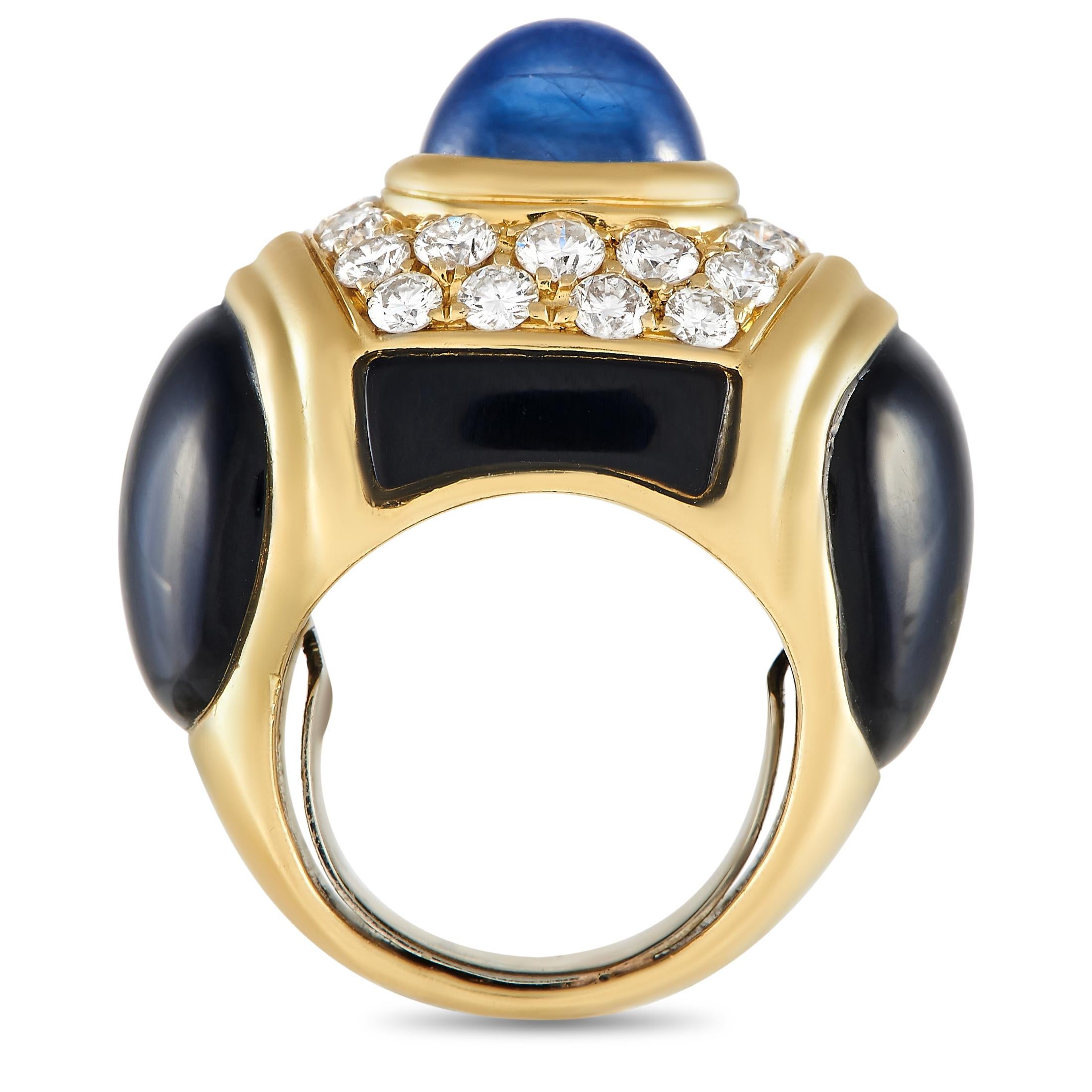 Up your accessorizing style with the pronounced beauty of this cocktail ring. The chunky ring is made from 18K yellow gold and features a combination of diamonds that total 1.25 carats, onyx, and a blue sapphire cabochon top that totals