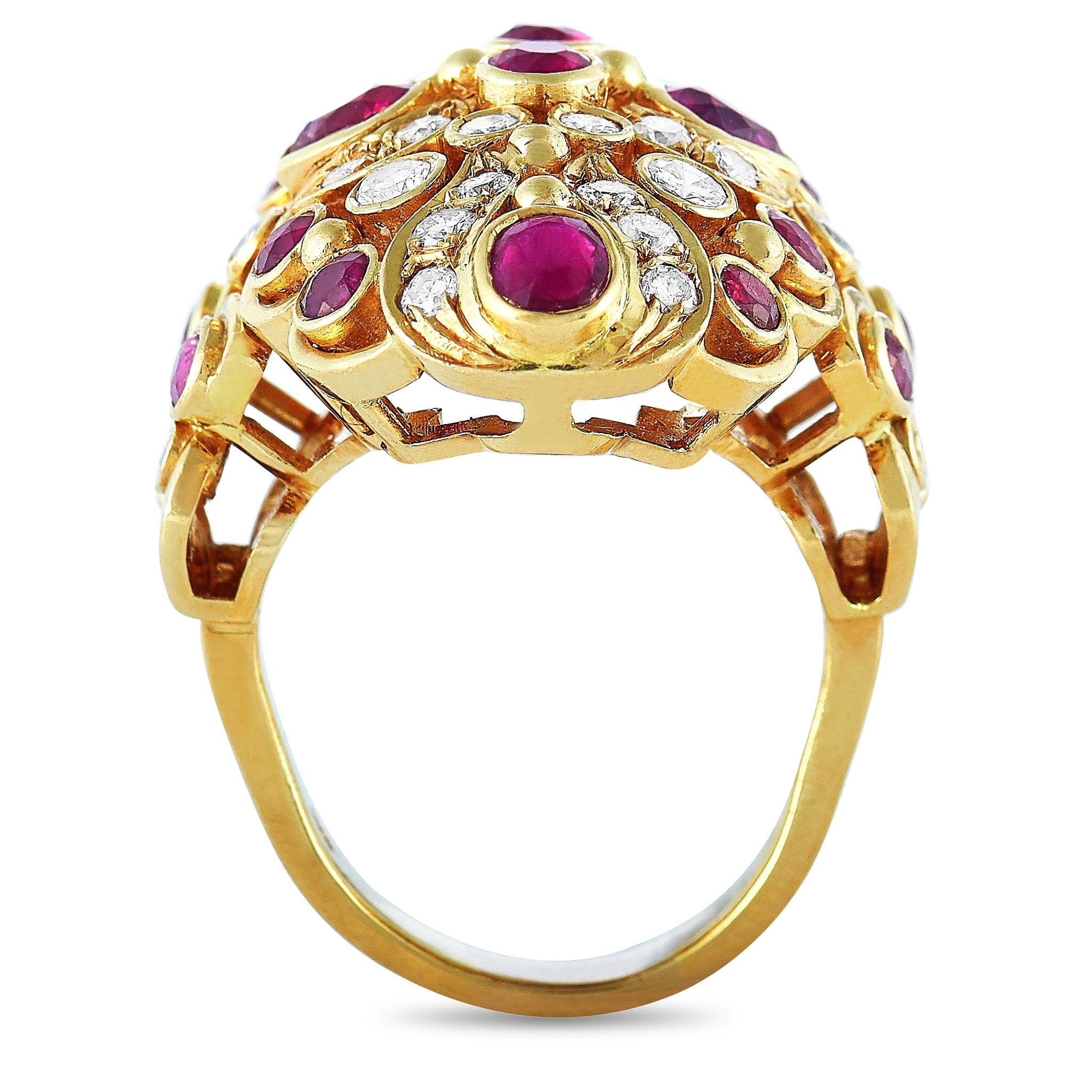 This LB Exclusive ring is crafted from 18K yellow gold and weighs 20.6 grams. It boasts band thickness of 3 mm and top height of 13 mm, while top dimensions measure 25 by 35 mm. The ring is set with diamonds and rubies that total 1.45 and 3.99