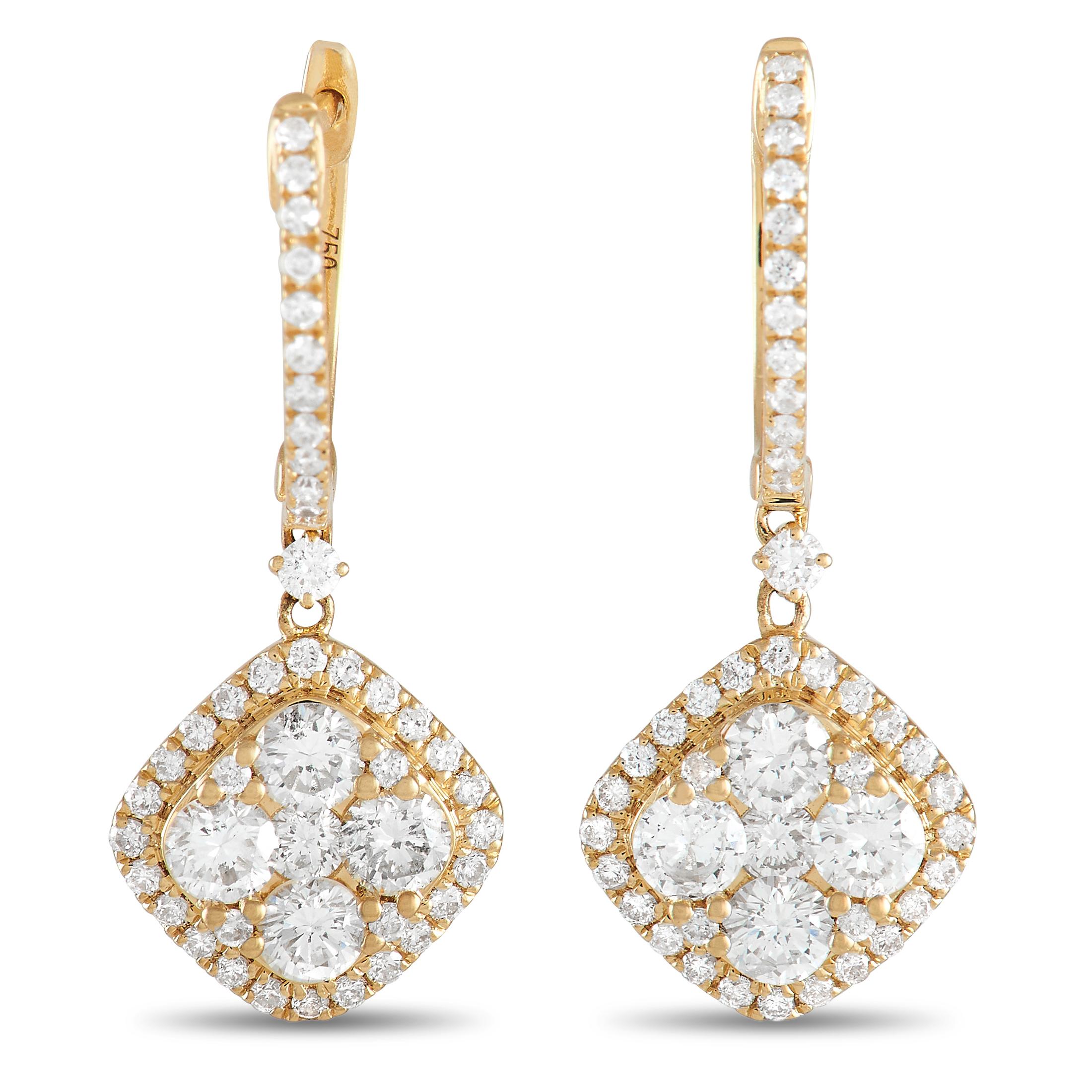 These elegant earrings were designed to make a statement. Stylish and sophisticated, each one features an 18K Yellow Gold setting that measures 1.0” long and 0.50” wide. Diamonds with a total weight of 1.77 carats allow them to continually catch the